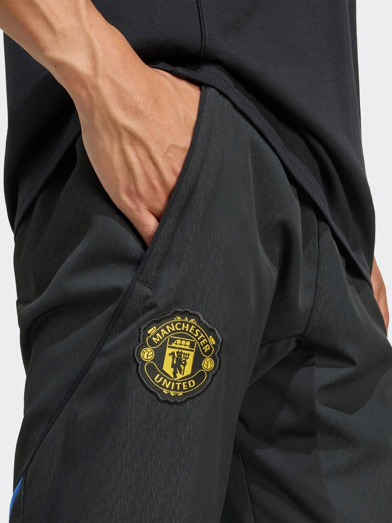 adidas-mens-manchester-united-tiro-25-competition-presentation-pant-blackoutfit