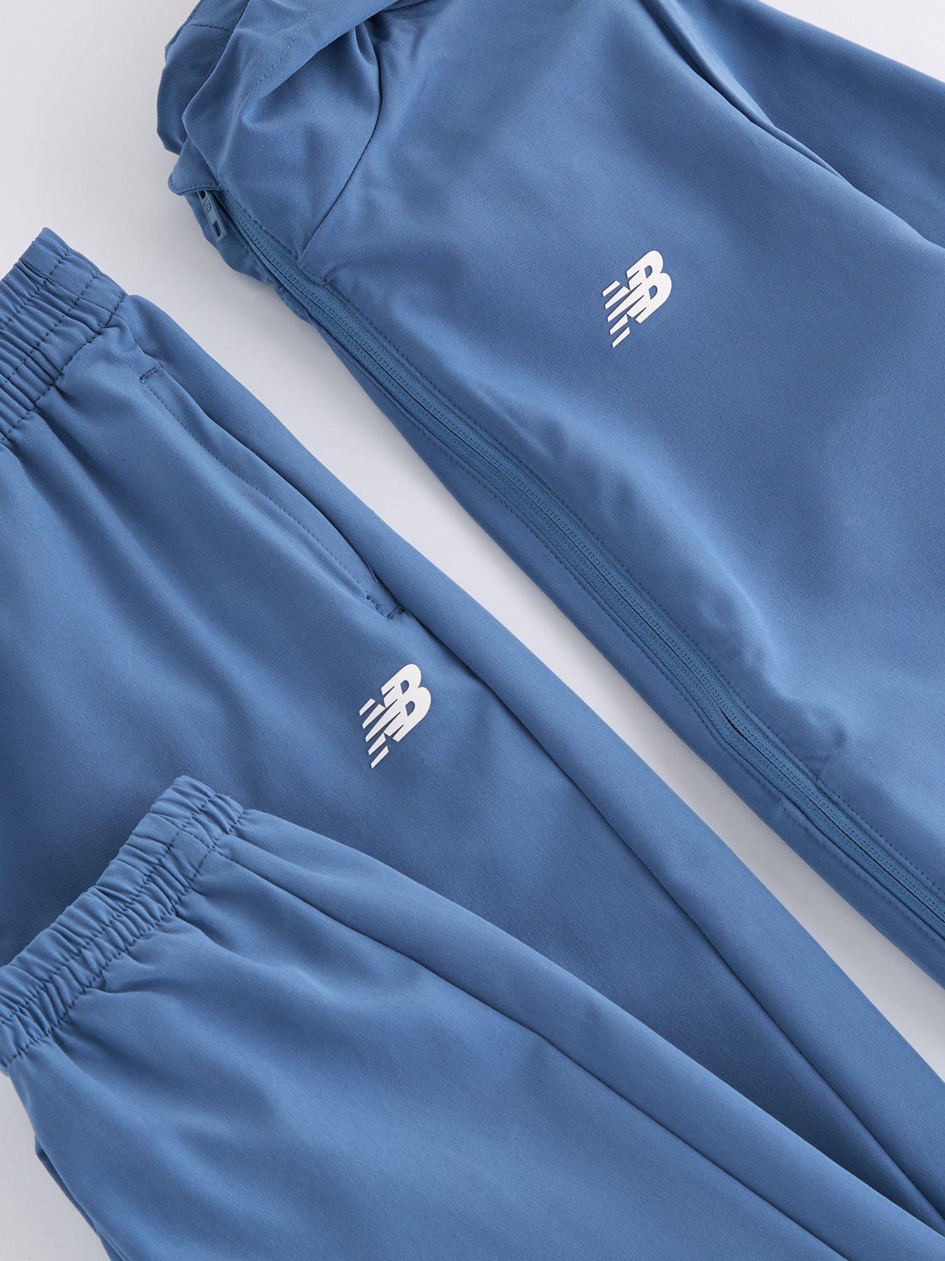 new-balance-junior-boys-lightweight-jacket-and-pant-set-bluedetail