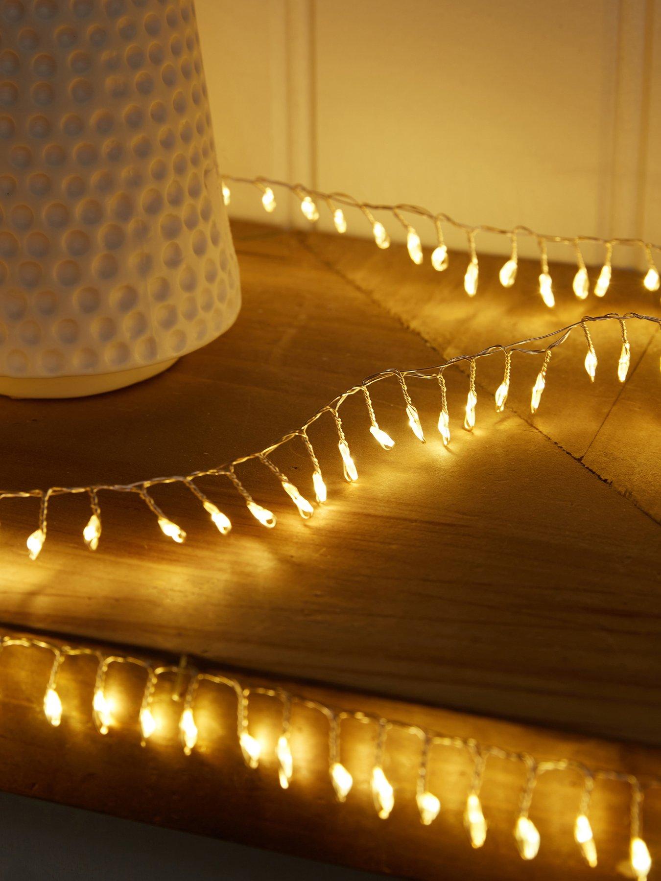 festive-500-led-dewdrop-indooroutdoor-christmas-cluster-lights-warm-whitefront