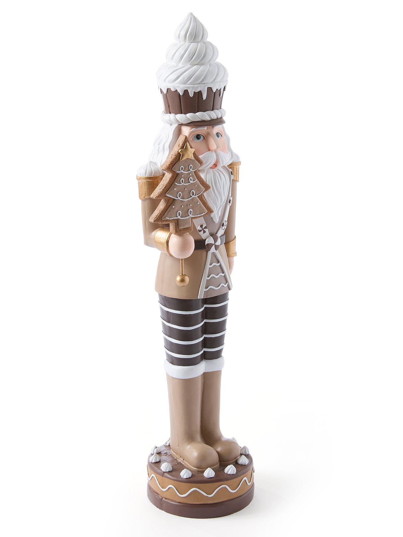 festive-93nbspcm-brownwhite-nutcracker-withnbspcake-hat-and-tree-christmas-decorationback