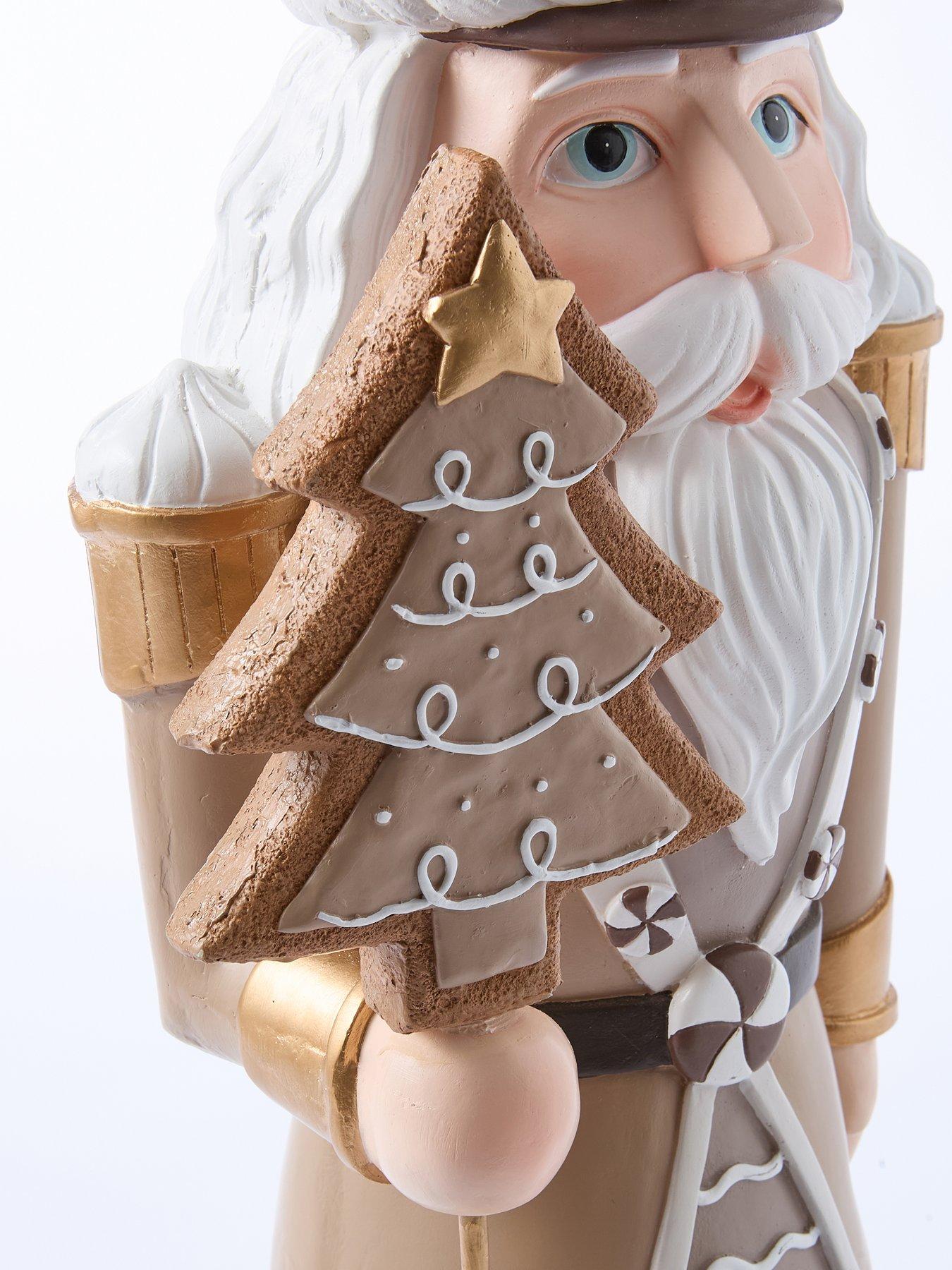 festive-93nbspcm-brownwhite-nutcracker-withnbspcake-hat-and-tree-christmas-decorationoutfit