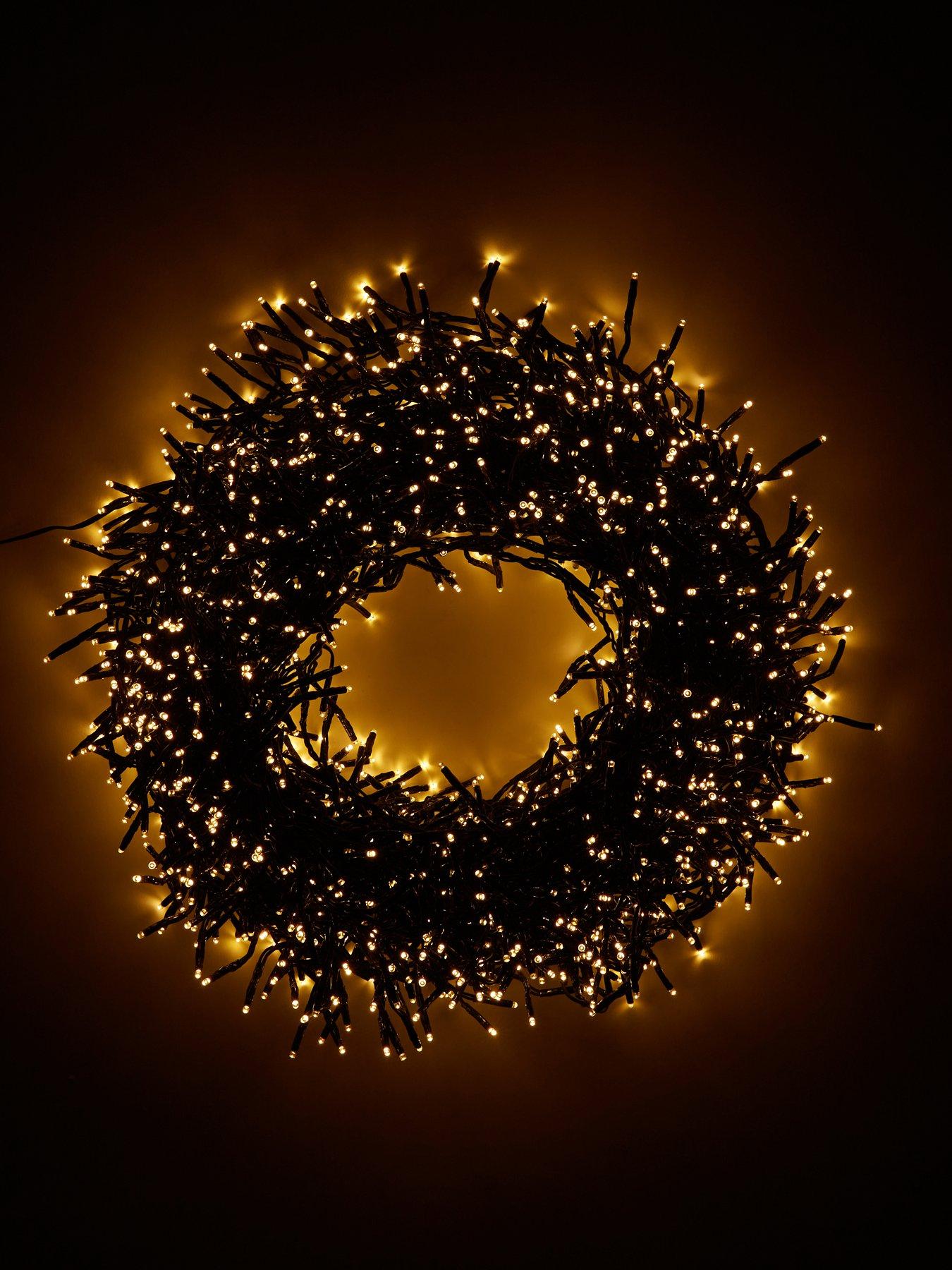 festive-multi-function-indooroutdoor-christmasnbspcluster-lights-2000--nbspwarm-whitestillFront