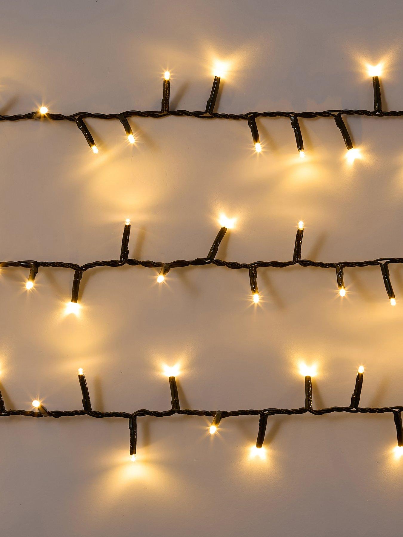 festive-multi-function-indooroutdoor-christmasnbspcluster-lights-2000--nbspwarm-whiteback