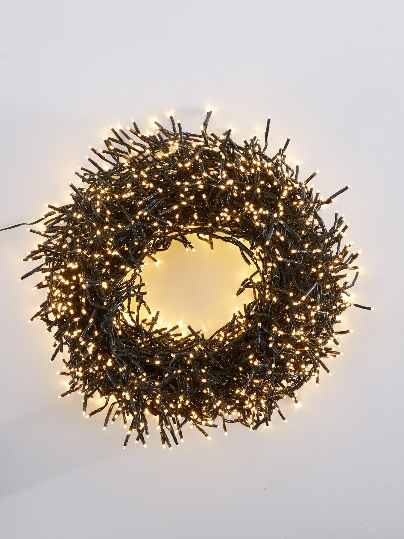 festive-multi-function-indooroutdoor-christmasnbspcluster-lights-2000--nbspwarm-whiteoutfit