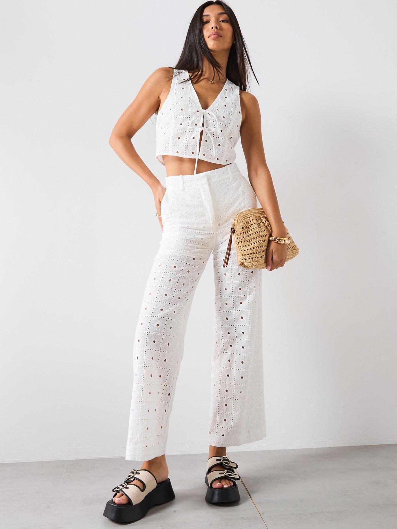mango-embroidered-cotton-waistcoat-with-bows-whitedetail