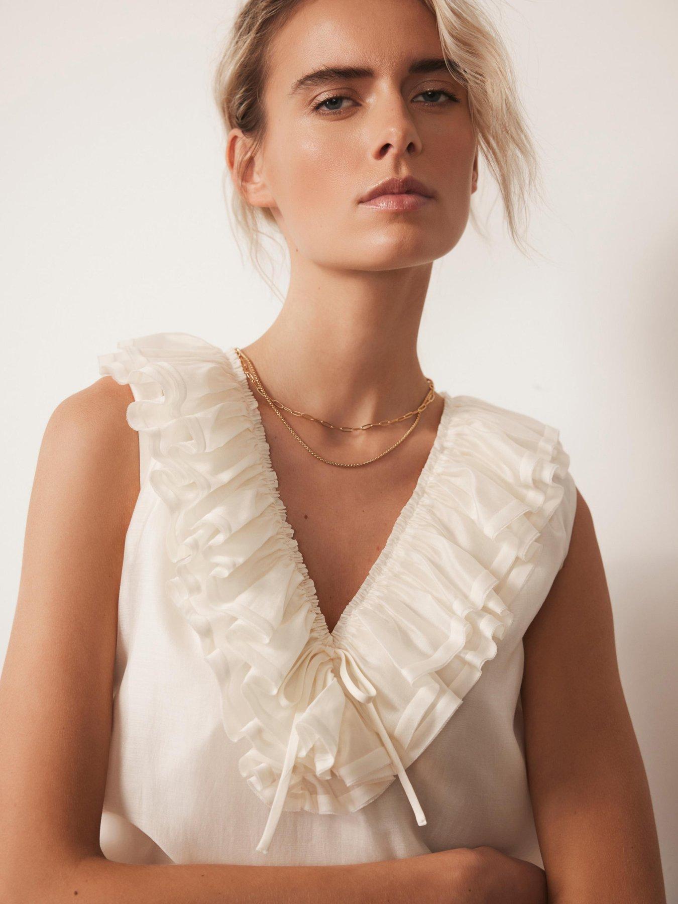 mint-velvet-cream-ruffle-front-top-whiteback
