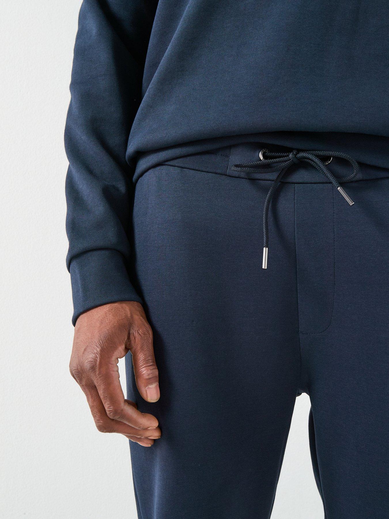 boss-c-locsin-01-regular-fit-nikel-logo-cuff-joggers-navyoutfit