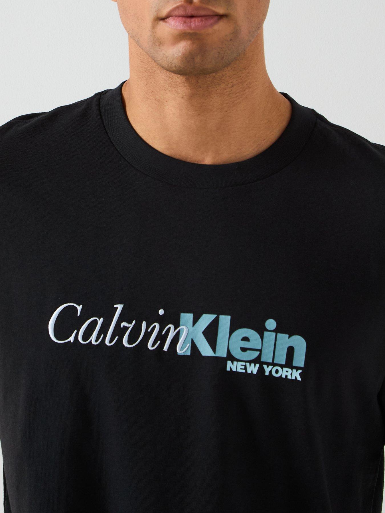 calvin-klein-cursive-graphic-logo-t-shirt-blackoutfit