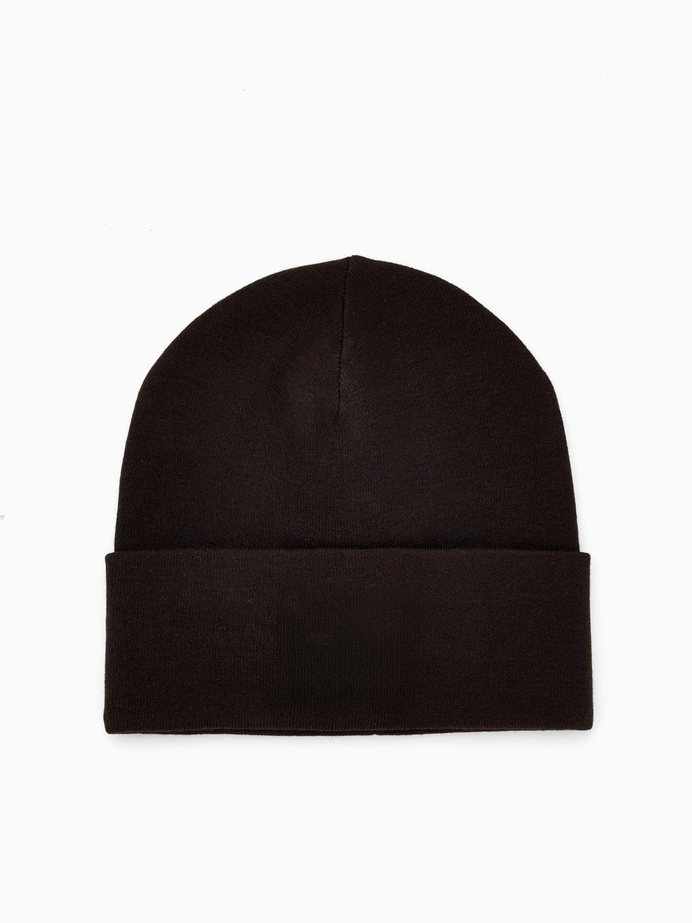 Image 2 of 4 of Calvin Klein Embellished Patch Ribbed Beanie - Black