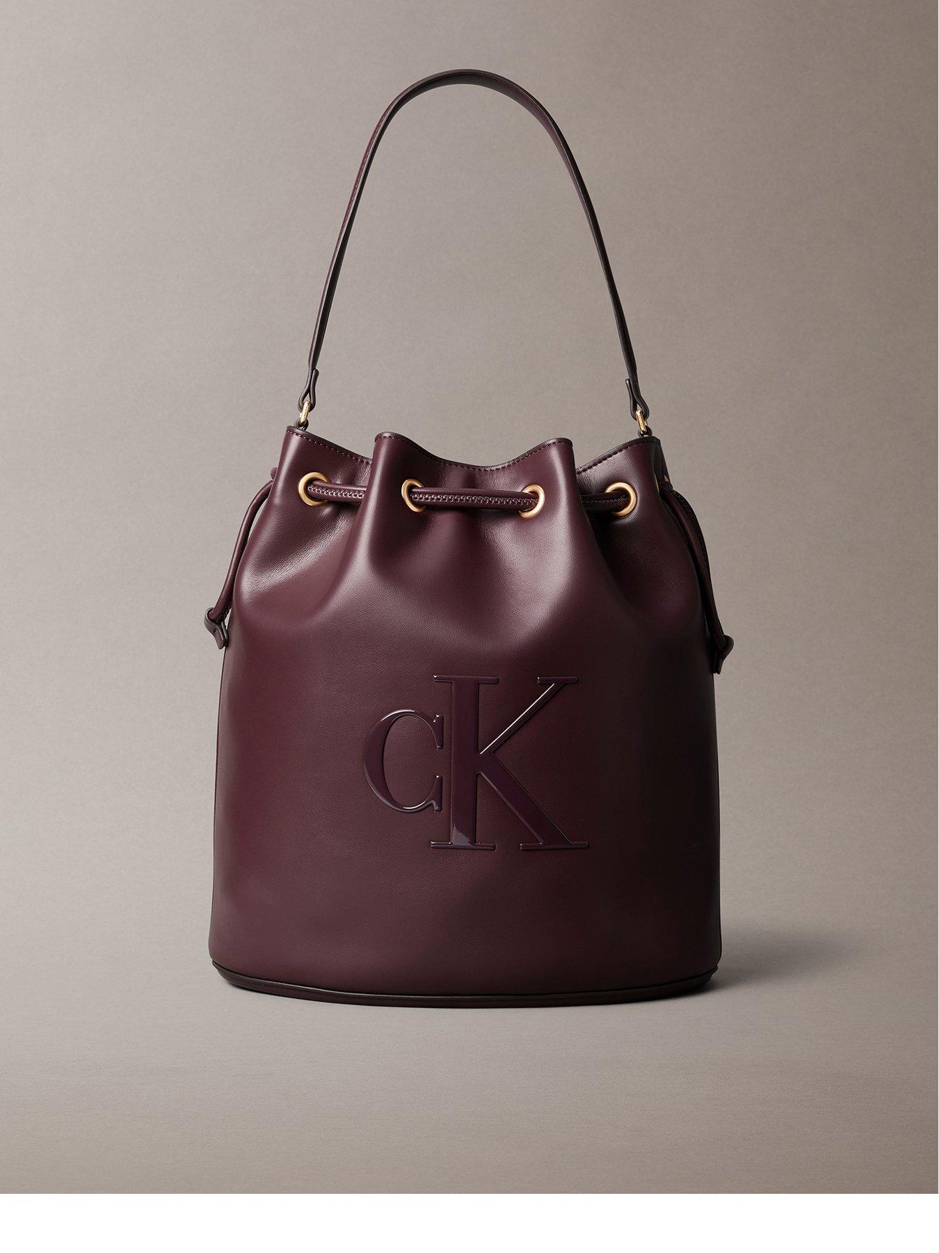 calvin-klein-raised-ck-logo-large-bucket-bag-brownfront