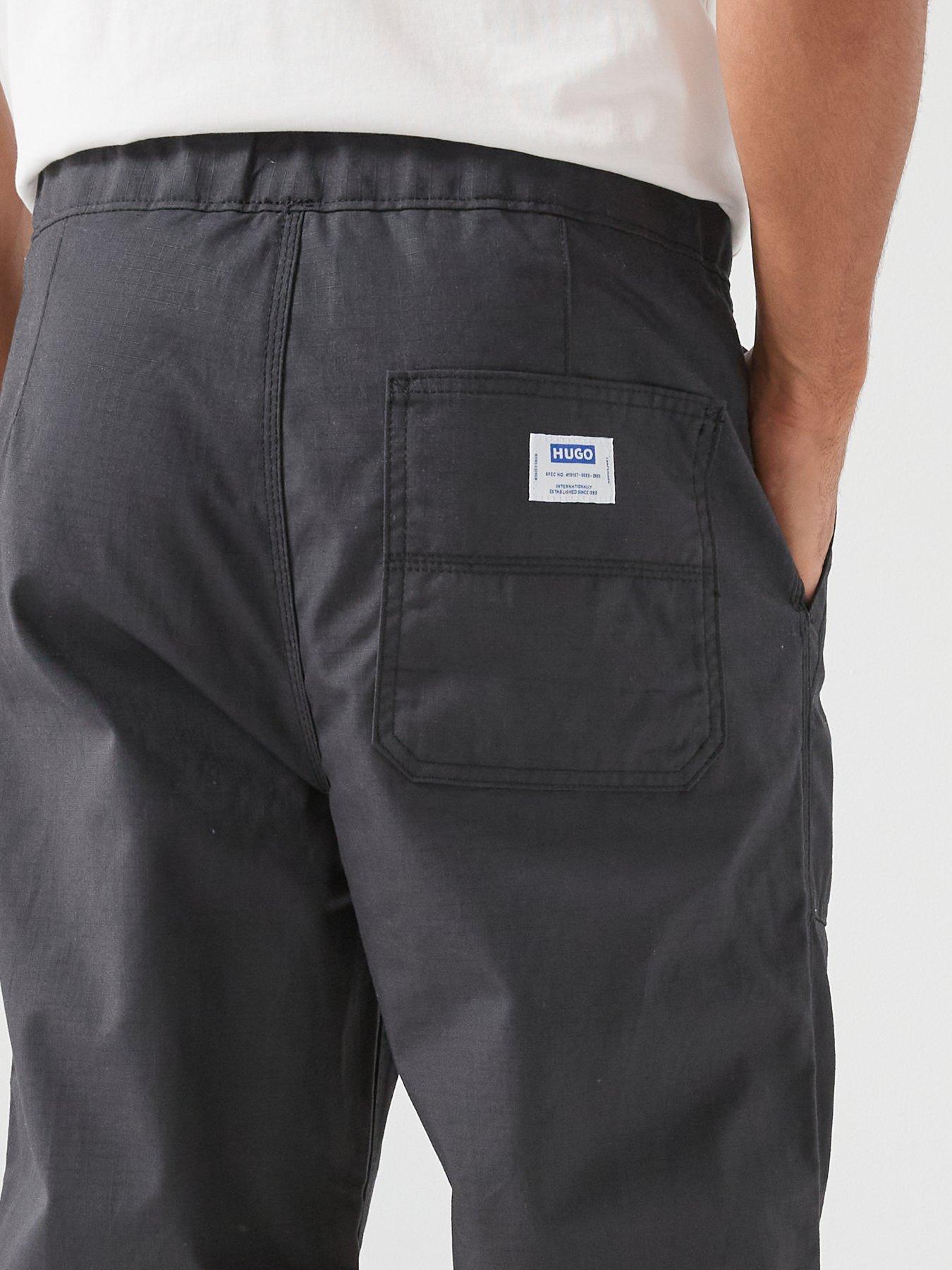 Image 4 of 5 of HUGO Geiko254 Tapered Fit Trousers - Black