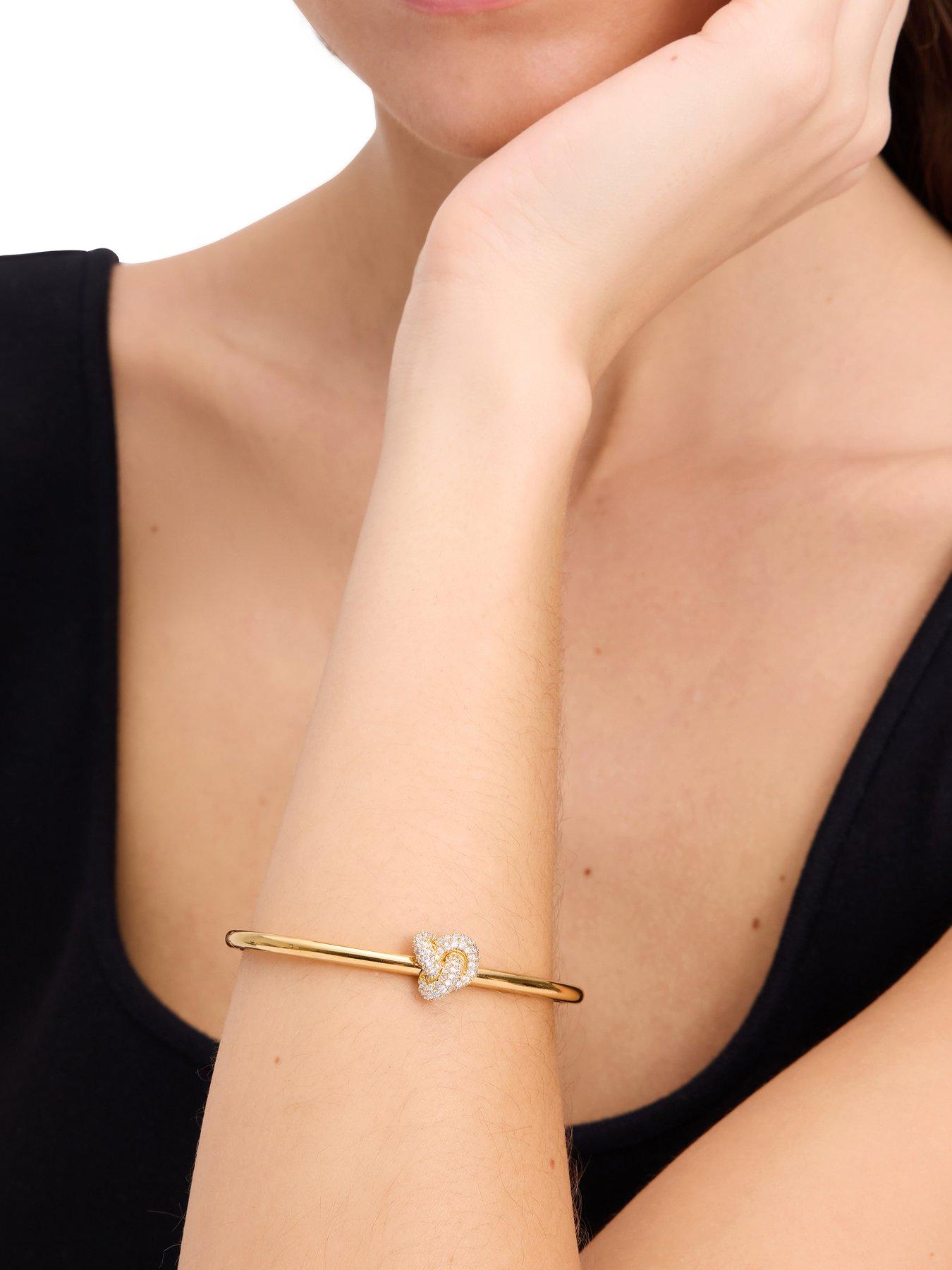 kate-spade-new-york-double-knot-pave-hnged-bangle-goldstillFront