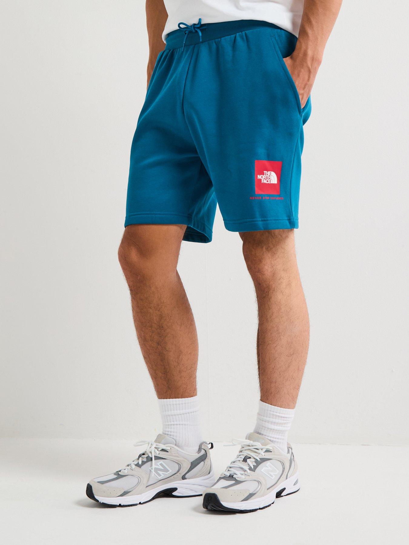 the-north-face-mens-box-nse-regular-short-blue