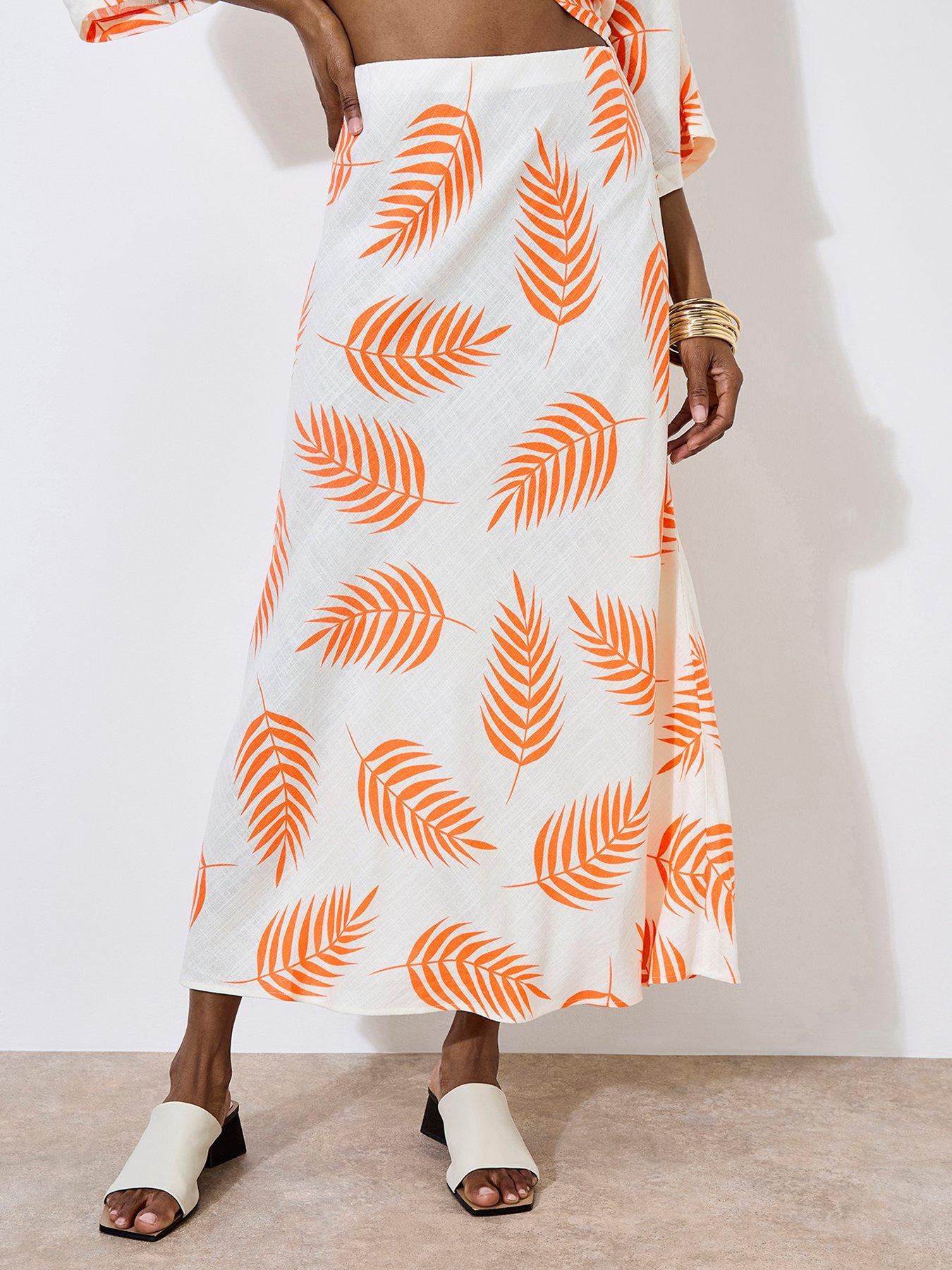 Image of Apricot Tropical Leaf Bias Maxi Skirt - Cream