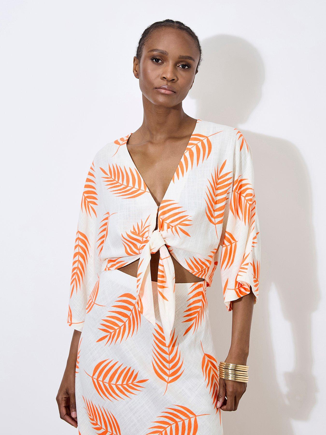 apricot-tropical-leaf-tie-hem-crop-top-creamfront