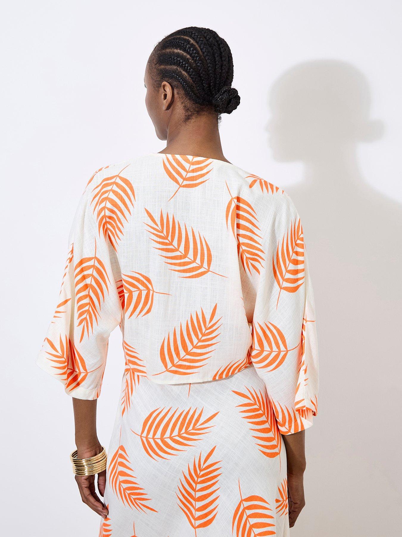 apricot-tropical-leaf-tie-hem-crop-top-creamstillFront