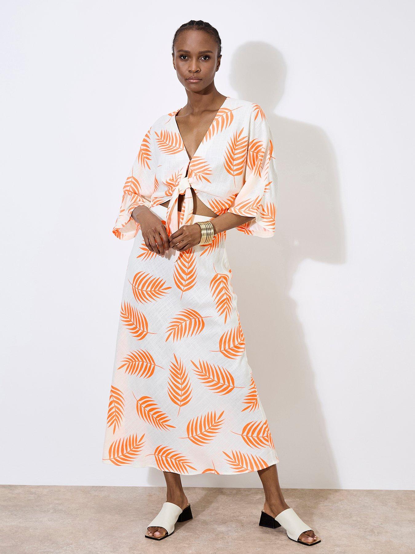 apricot-tropical-leaf-tie-hem-crop-top-creamback