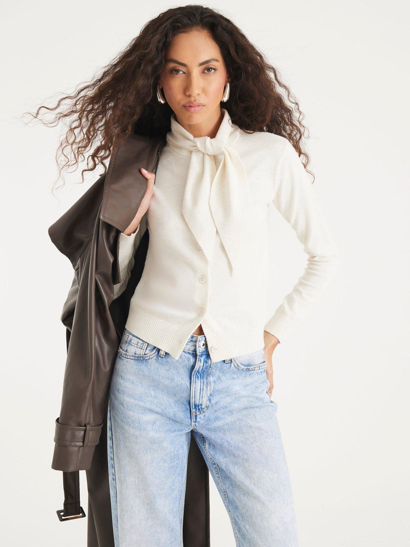 Image 1 of 4 of River Island Knitted Long Sleeve Tie Neck Top - Cream