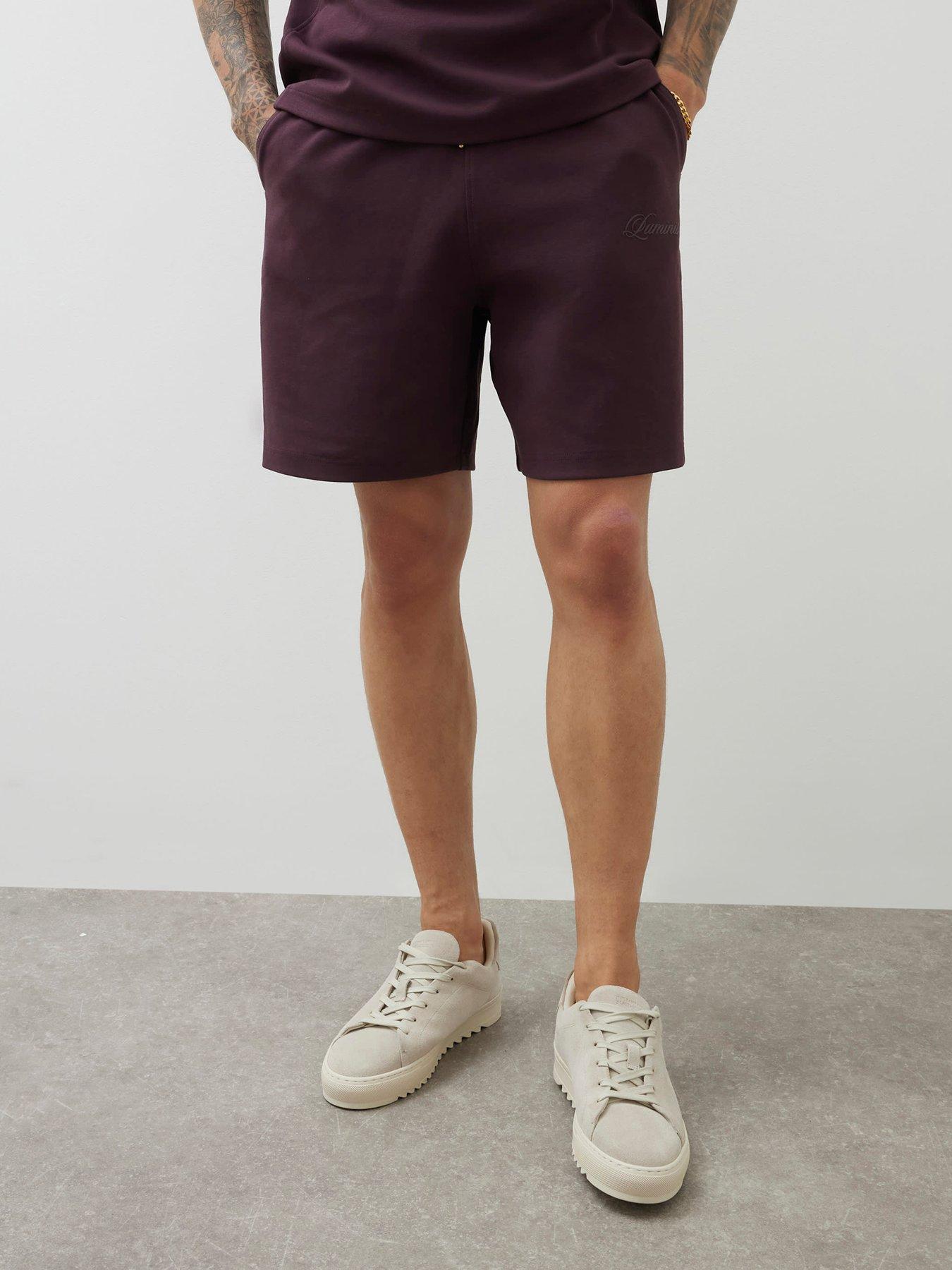 Image 1 of 4 of River Island Luminis Script Interlock Shorts - Dark Purple