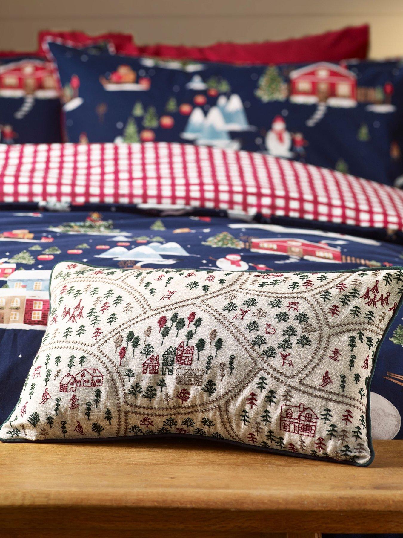 Catherine Lansfield Christmas Ski Village Filled Cushion- 30x50cm