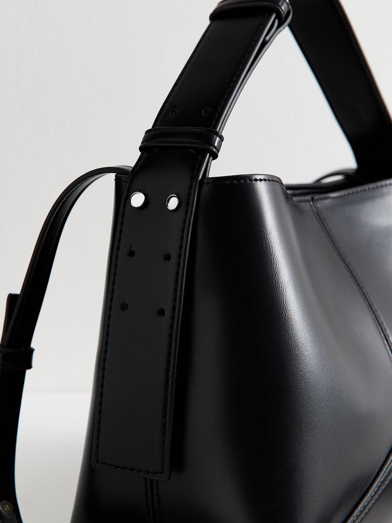 Image 4 of 5 of New Look Faux Leather Panelled Bucket Bag - Black