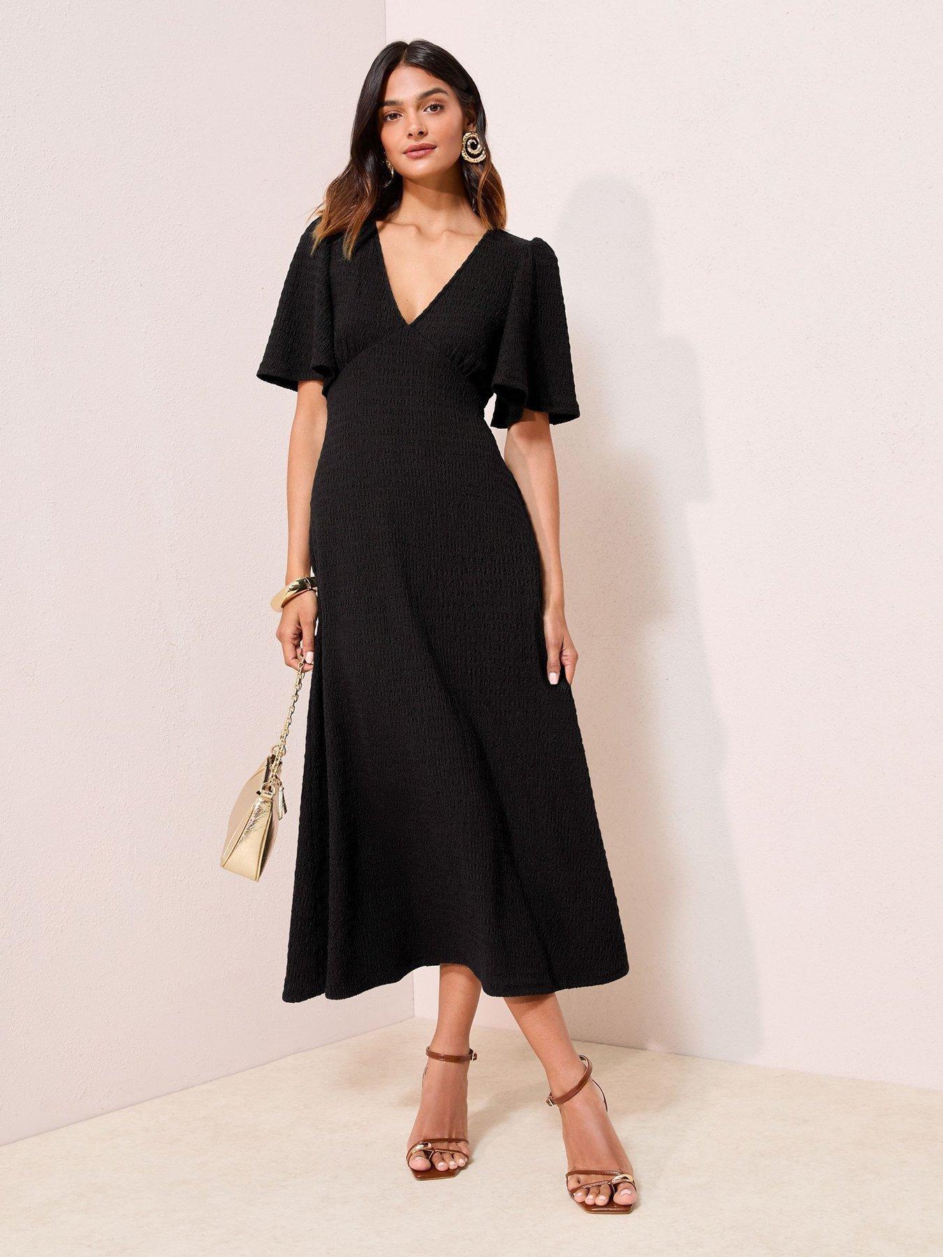 friends-like-these-textured-v-neck-midi-dress-green