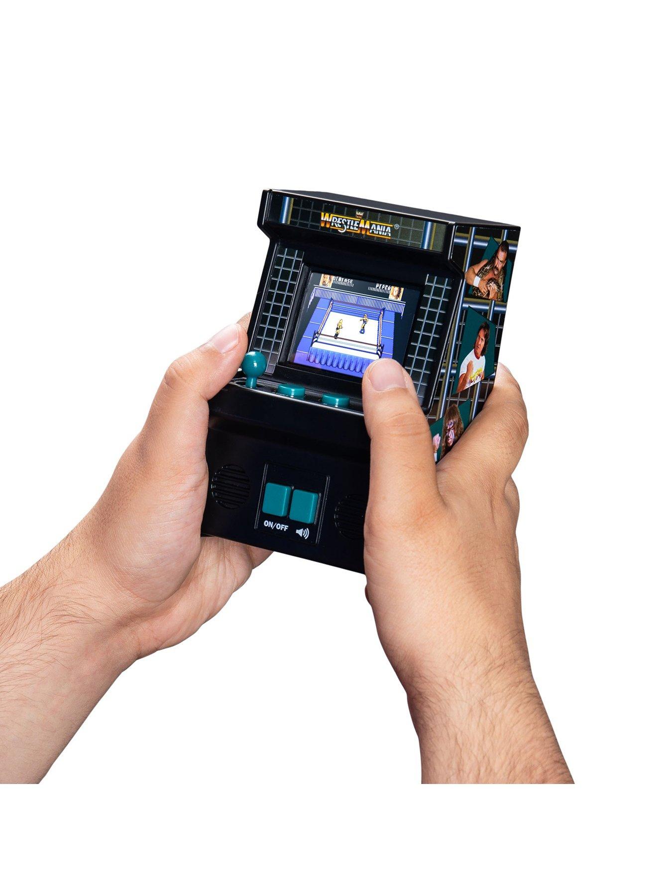 Image 4 of 6 of WWE Handheld Electronic Arcade Game - WWE