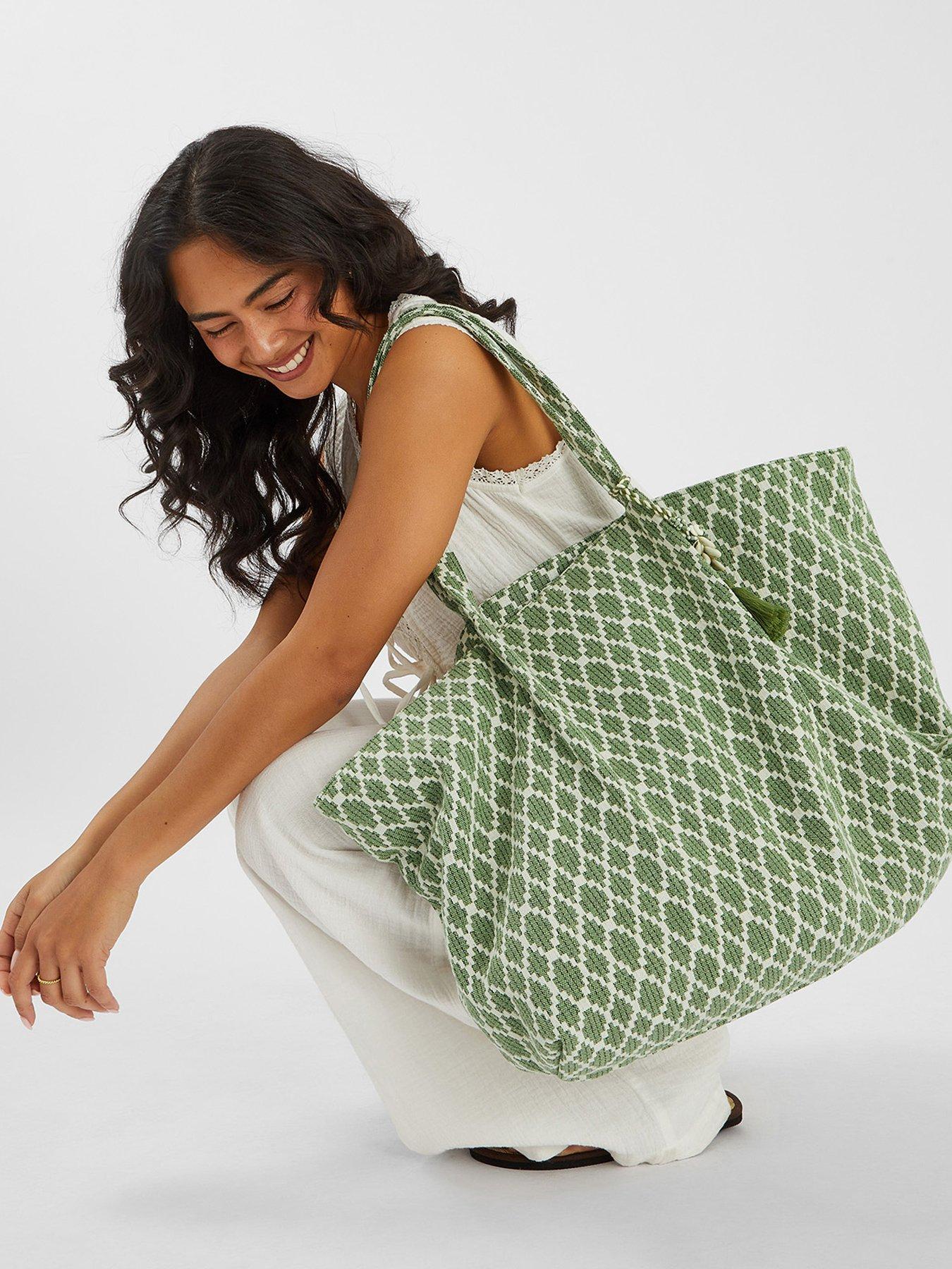 accessorize-geometric-print-weekender-bag-greenstillFront