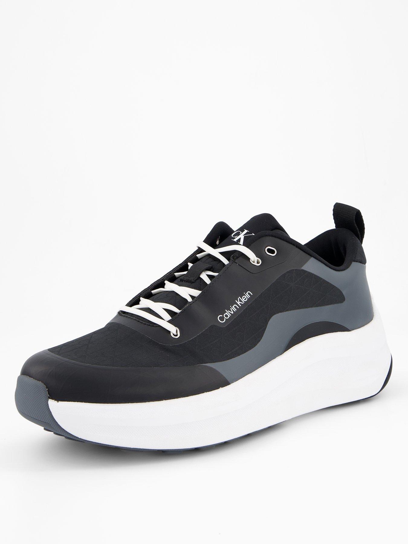 Image 2 of 7 of Calvin Klein Andrea All Over Emblem Trainers - Black