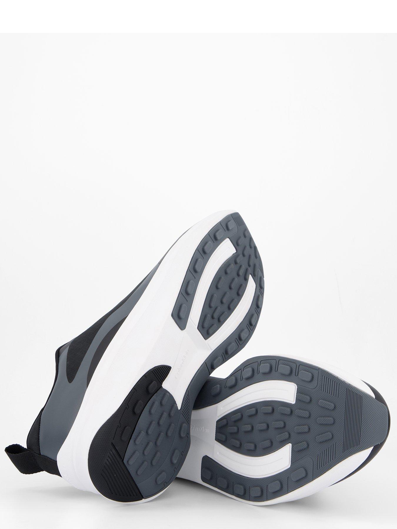 Image 4 of 7 of Calvin Klein Andrea All Over Emblem Trainers - Black