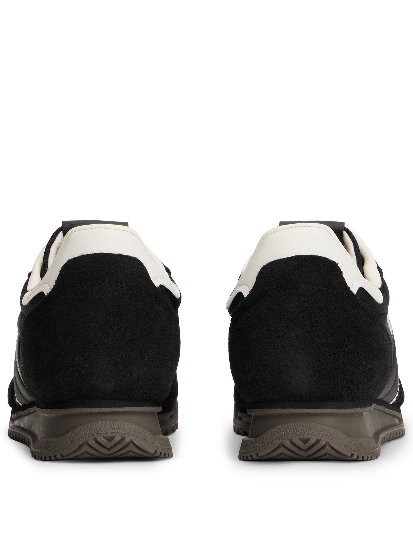 Image 3 of 6 of Tommy Jeans Cleated Retro Runner Trainers - Black