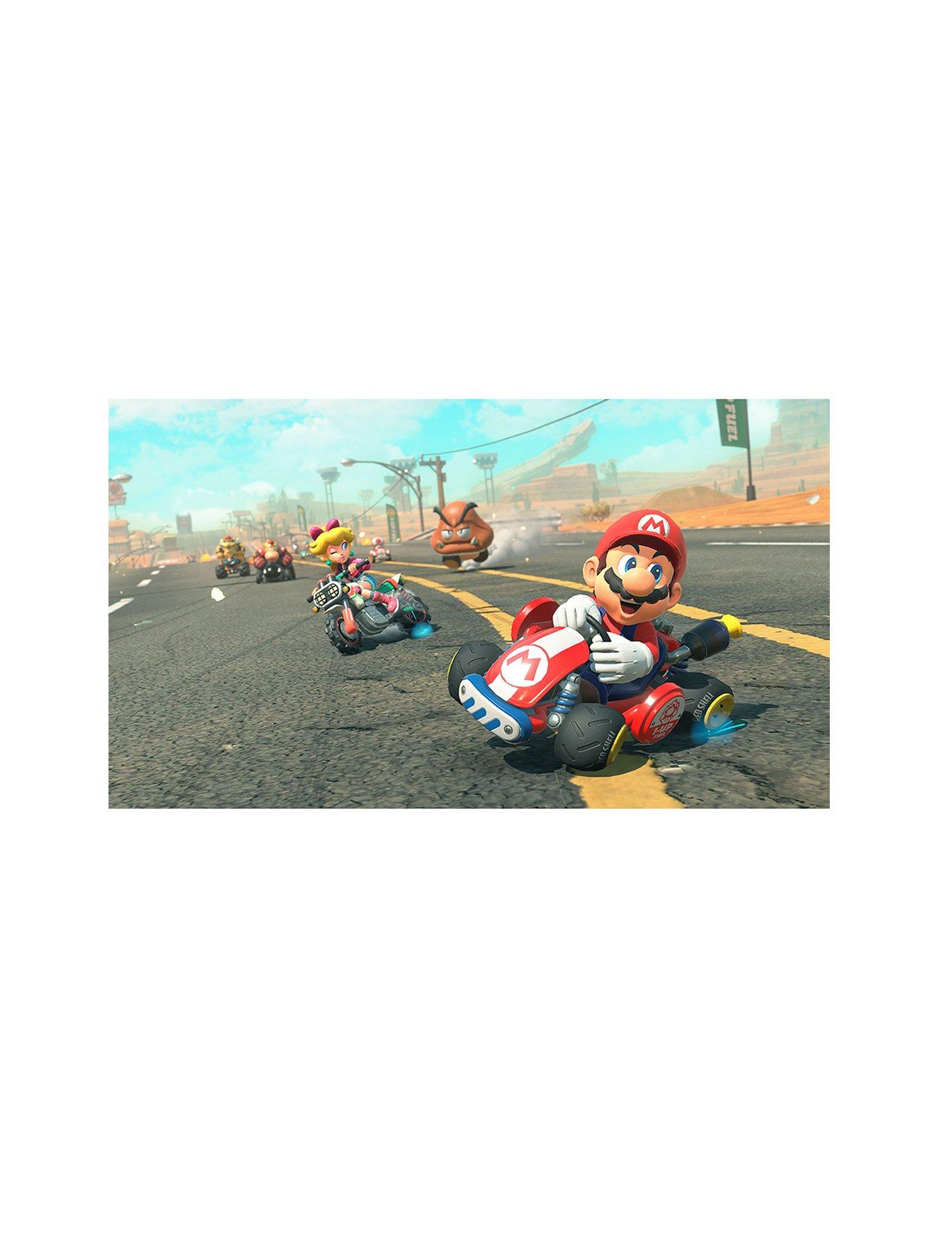Image 2 of 7 of Nintendo Switch 2 Zelda + Mario Kart World + Pro Controller