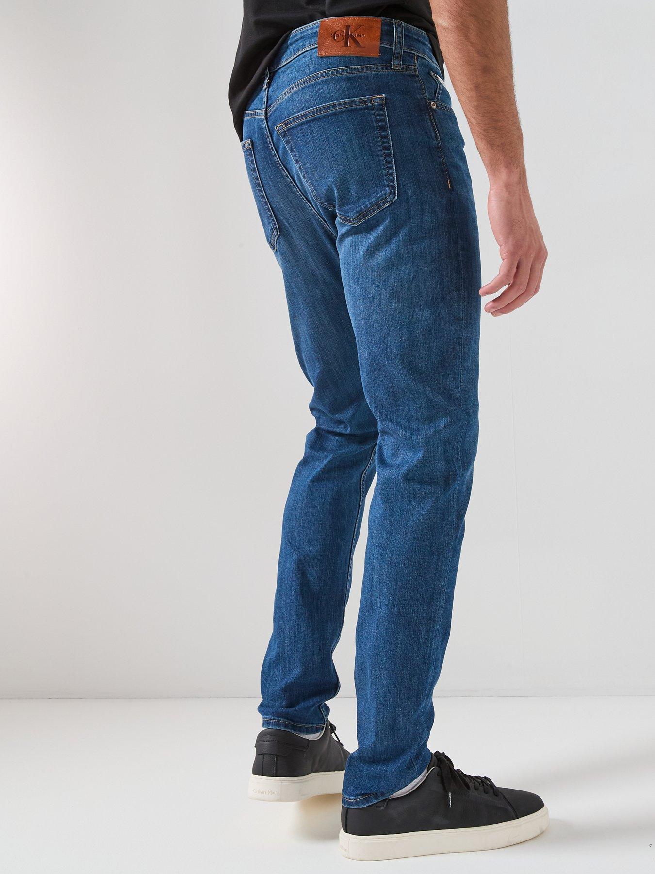 Image 2 of 6 of Calvin Klein Slim Fit Tapered Jean - Dark Blue