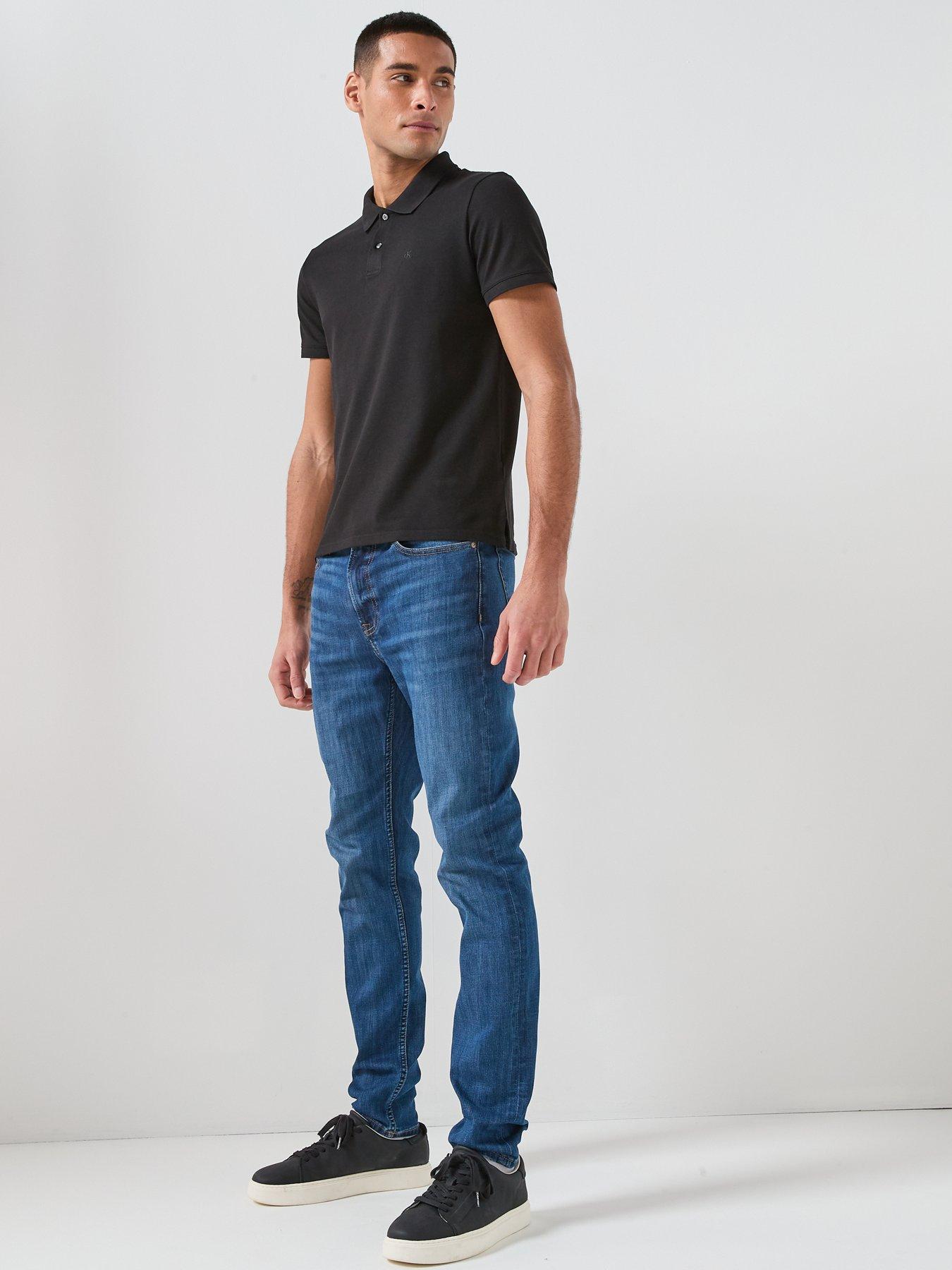 Image 6 of 6 of Calvin Klein Slim Fit Tapered Jean - Dark Blue