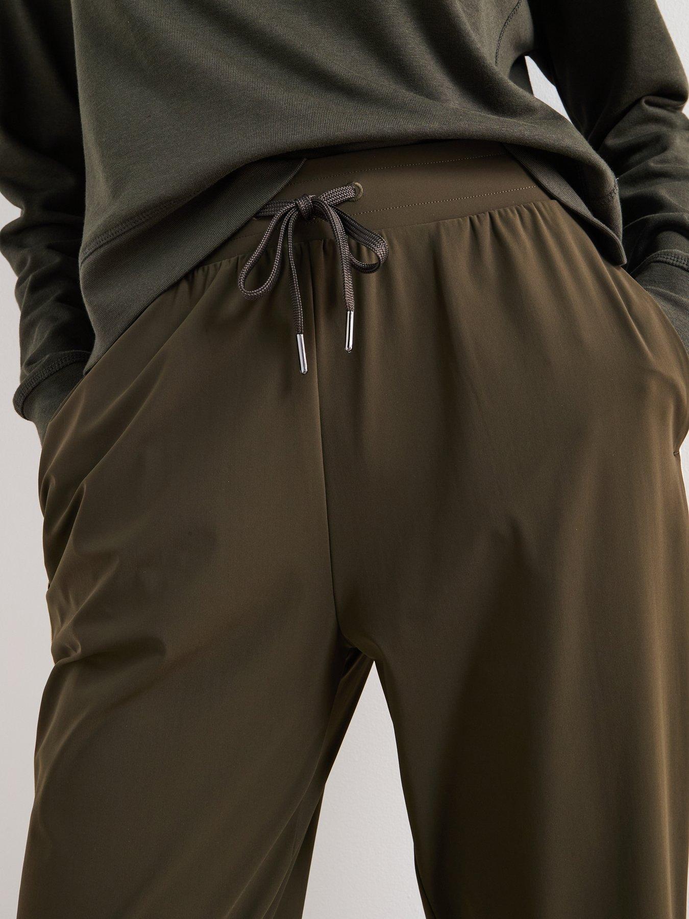 Image 4 of 6 of Sweaty Betty Explorer Side Stripe 25" Trouser - Green