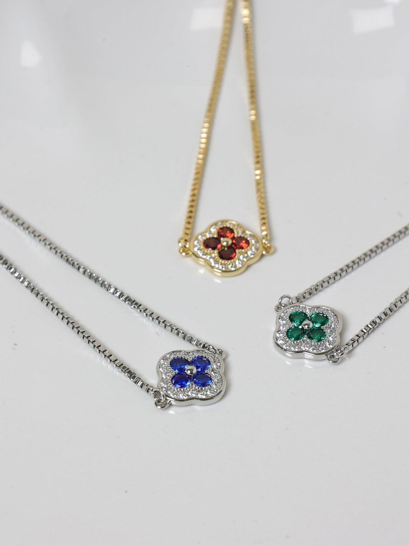 Image 5 of 5 of Jon Richard Jon Richard 14K Gold Plated and Ruby Clover Toggle Bracelet