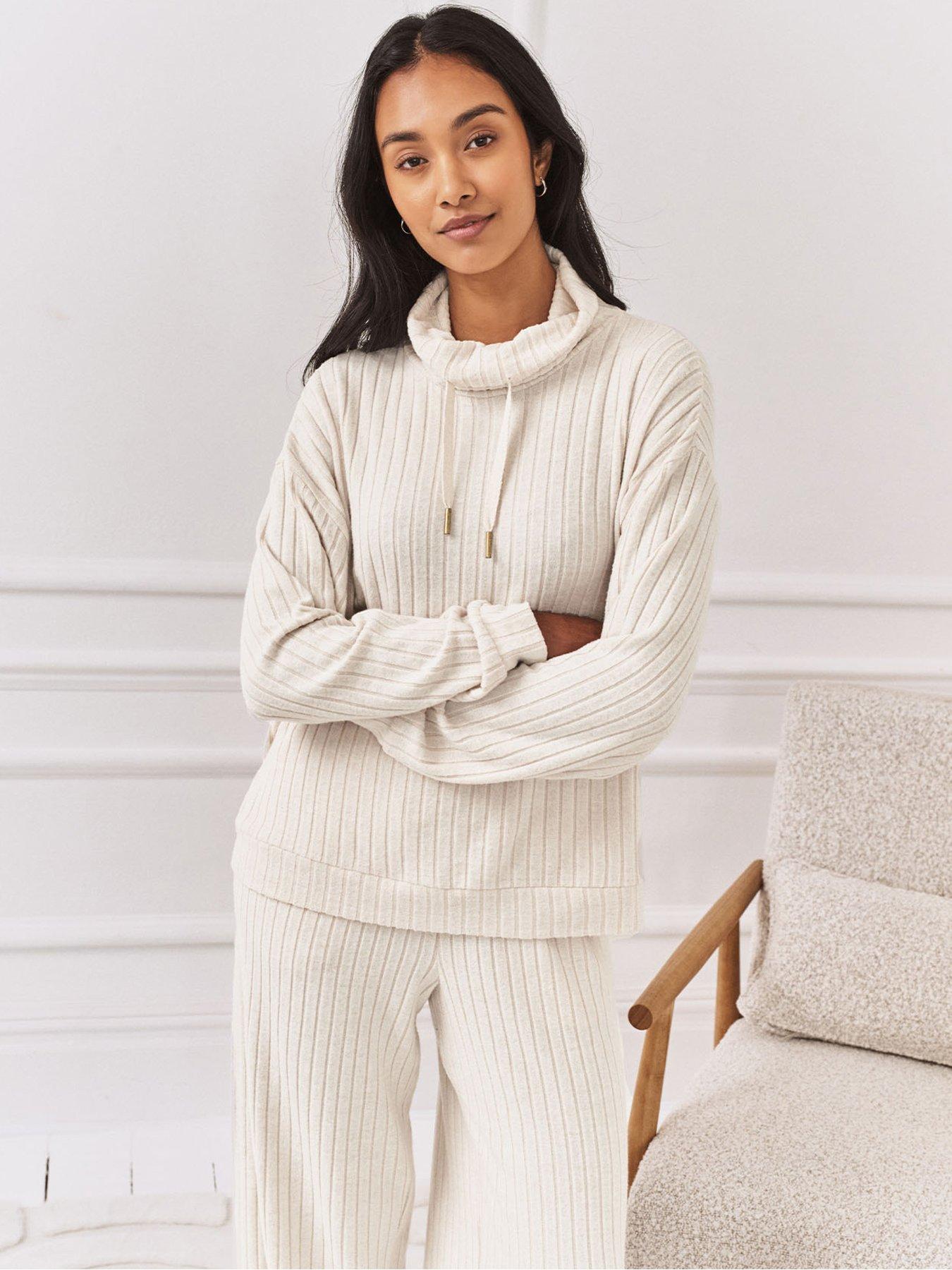 Image 1 of 6 of CHELSEA PEERS Ribbed Knit High Neck Sweatshirt - Off White