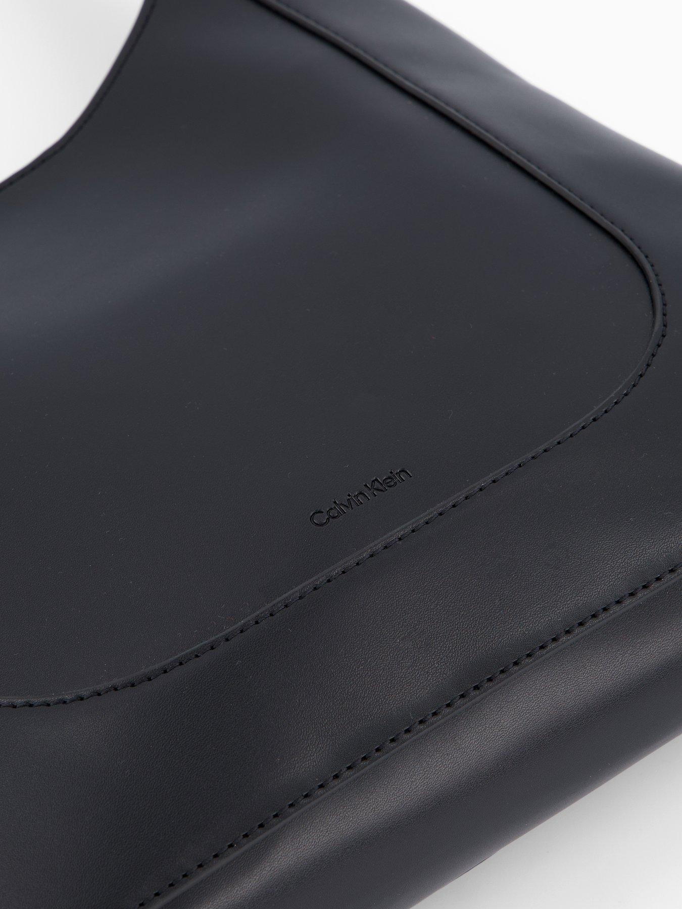 calvin-klein-engraved-hardware-adjustable-strap-medium-bag-blacktumbled-deep-goldoutfit