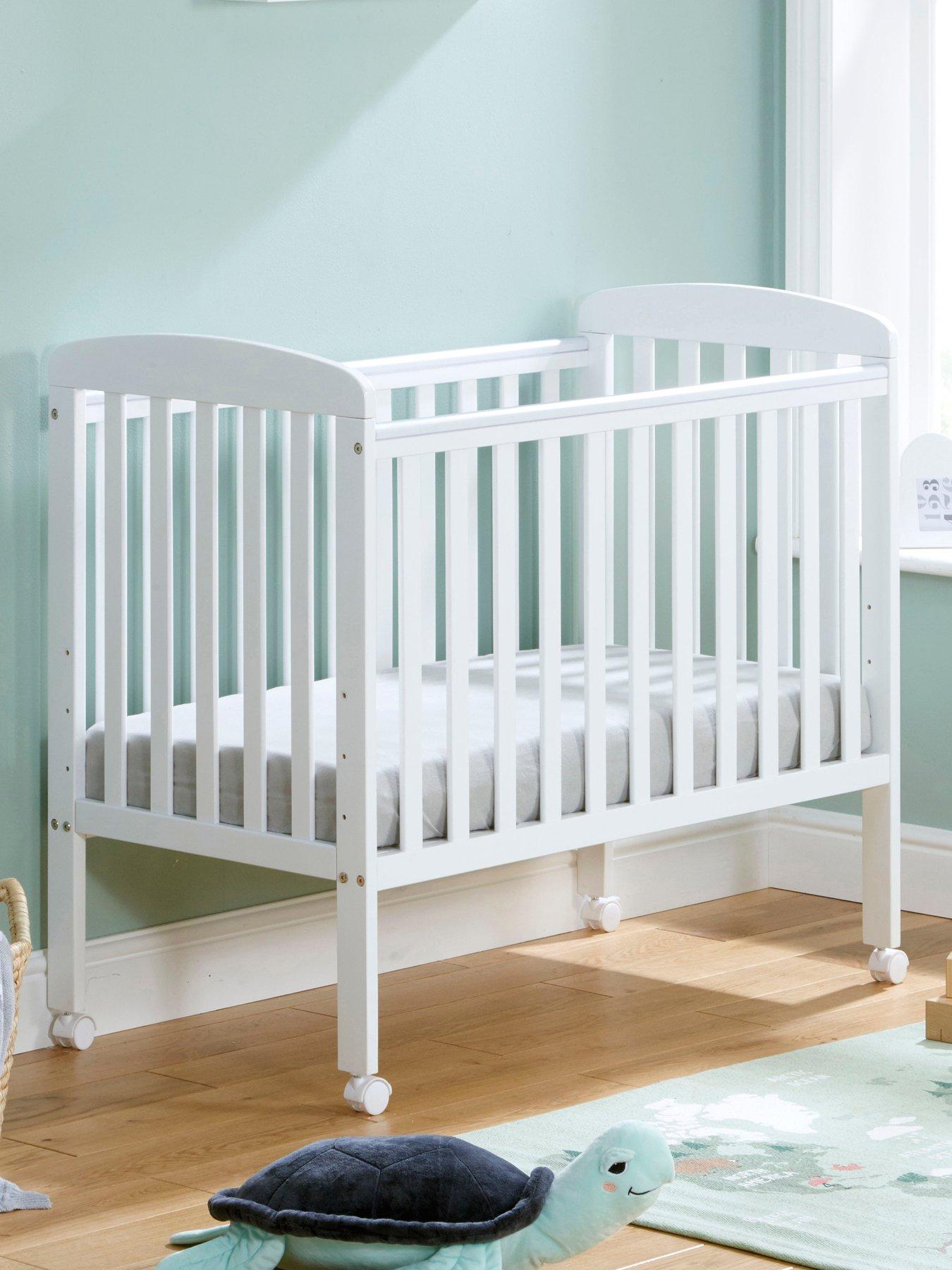 Image 1 of 7 of Babymore Space Saver Cot White with Fibre Mattress