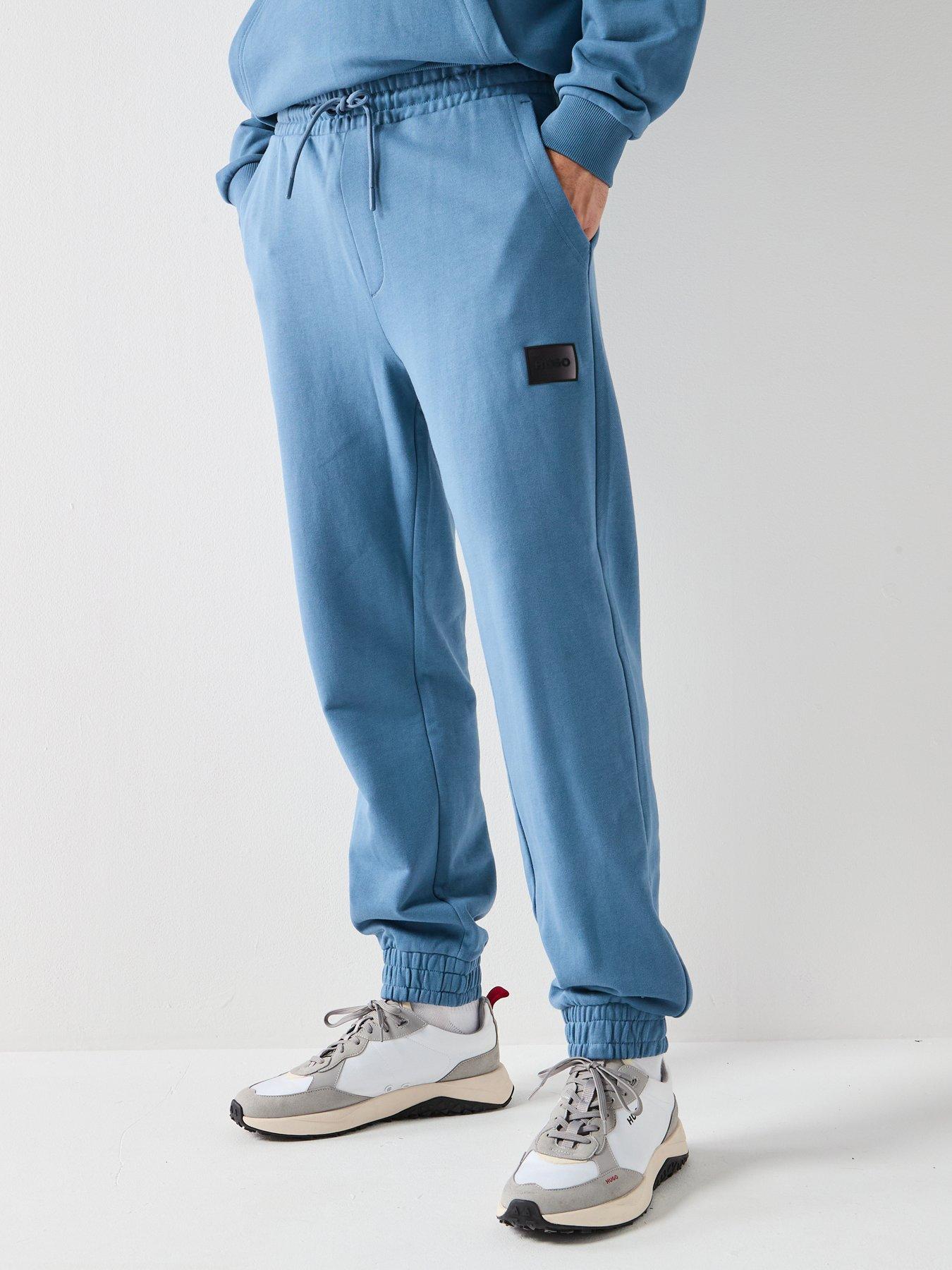 hugo-danopan-gradient-badge-logo-joggers-blue