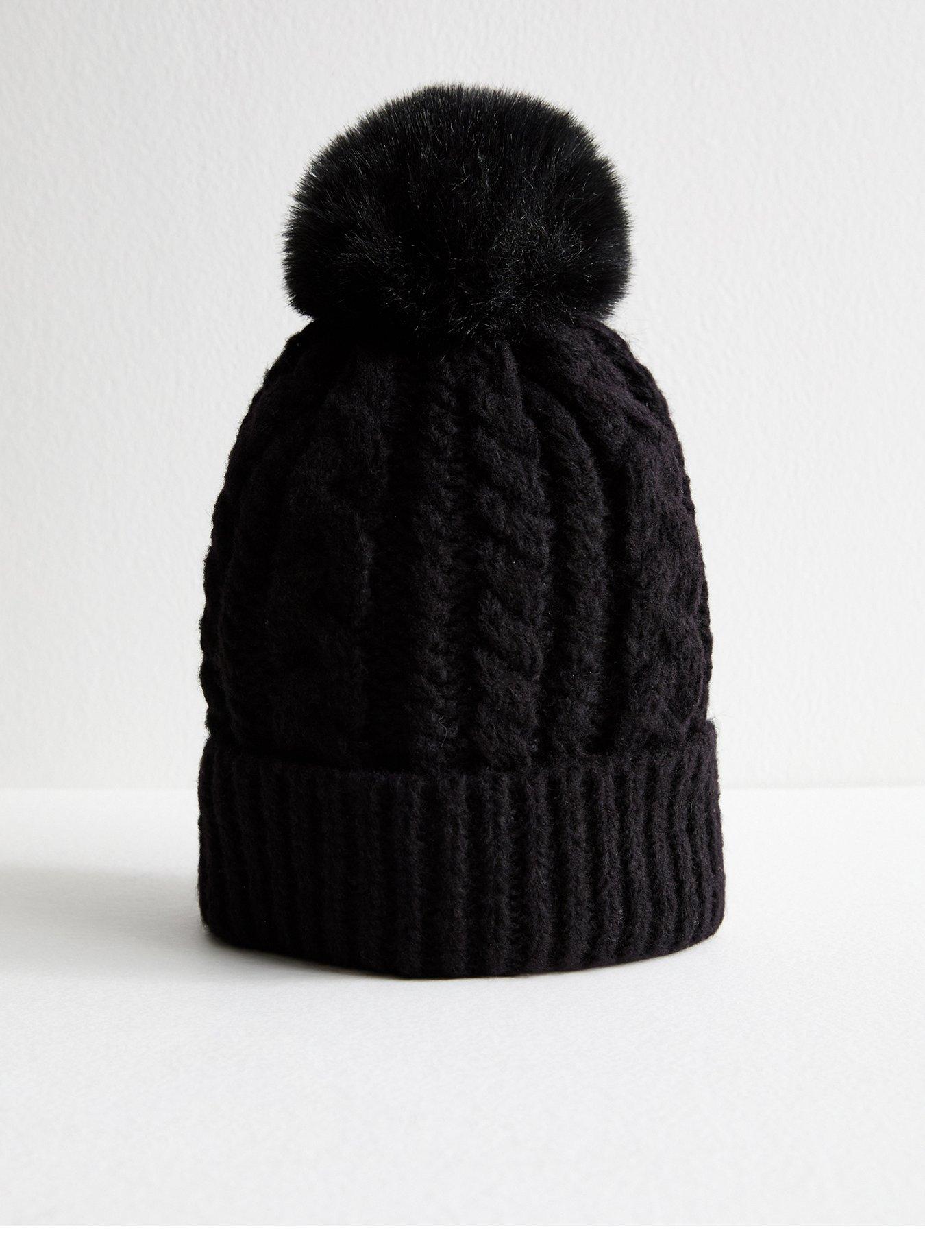 Image 1 of 3 of New Look Black Cable Knit Faux Fur Pom Pom Bobble Hat