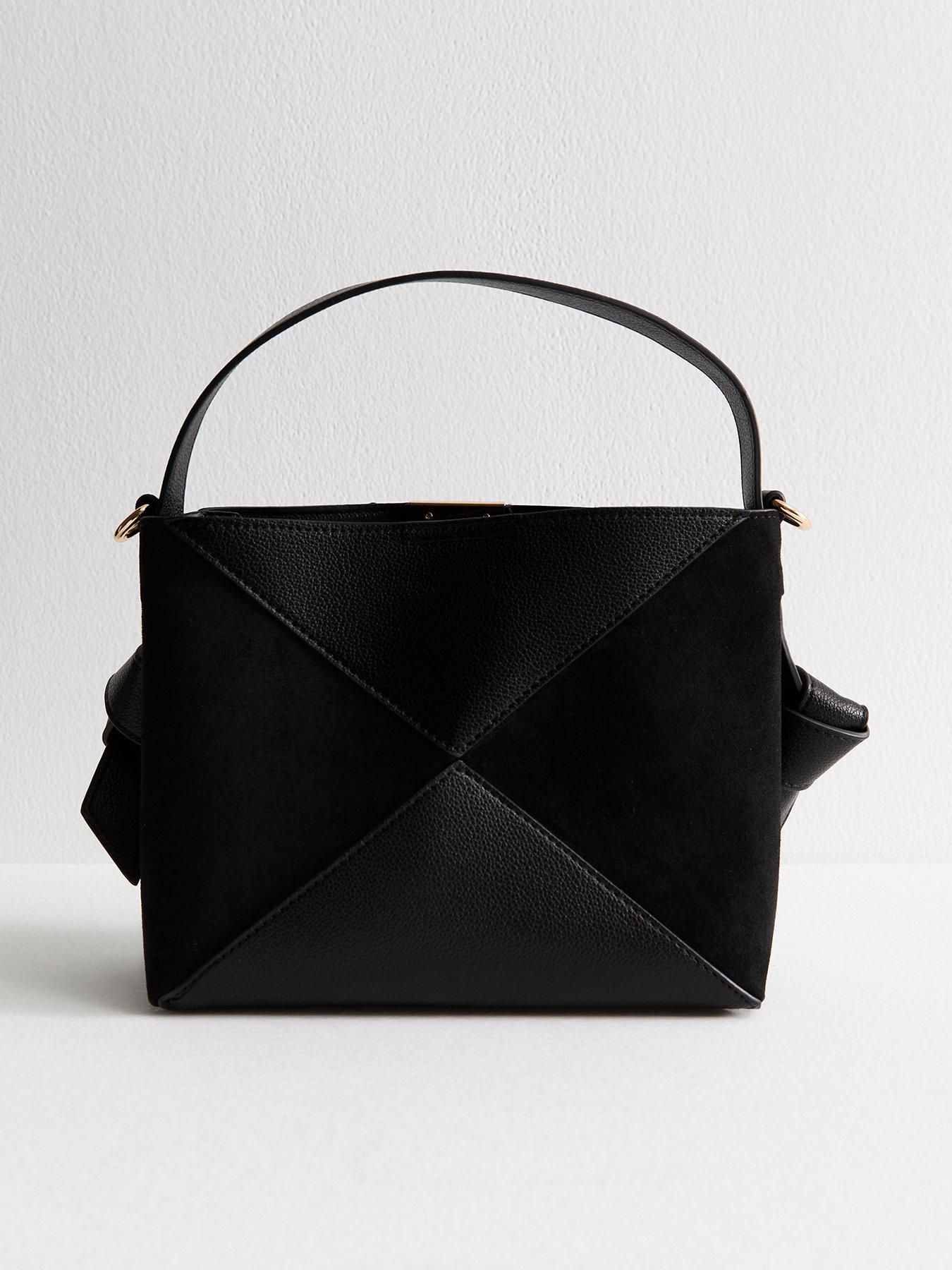 Image 1 of 5 of New Look Panelled Faux Leather And Suede Boxy Bucket Bag - Black