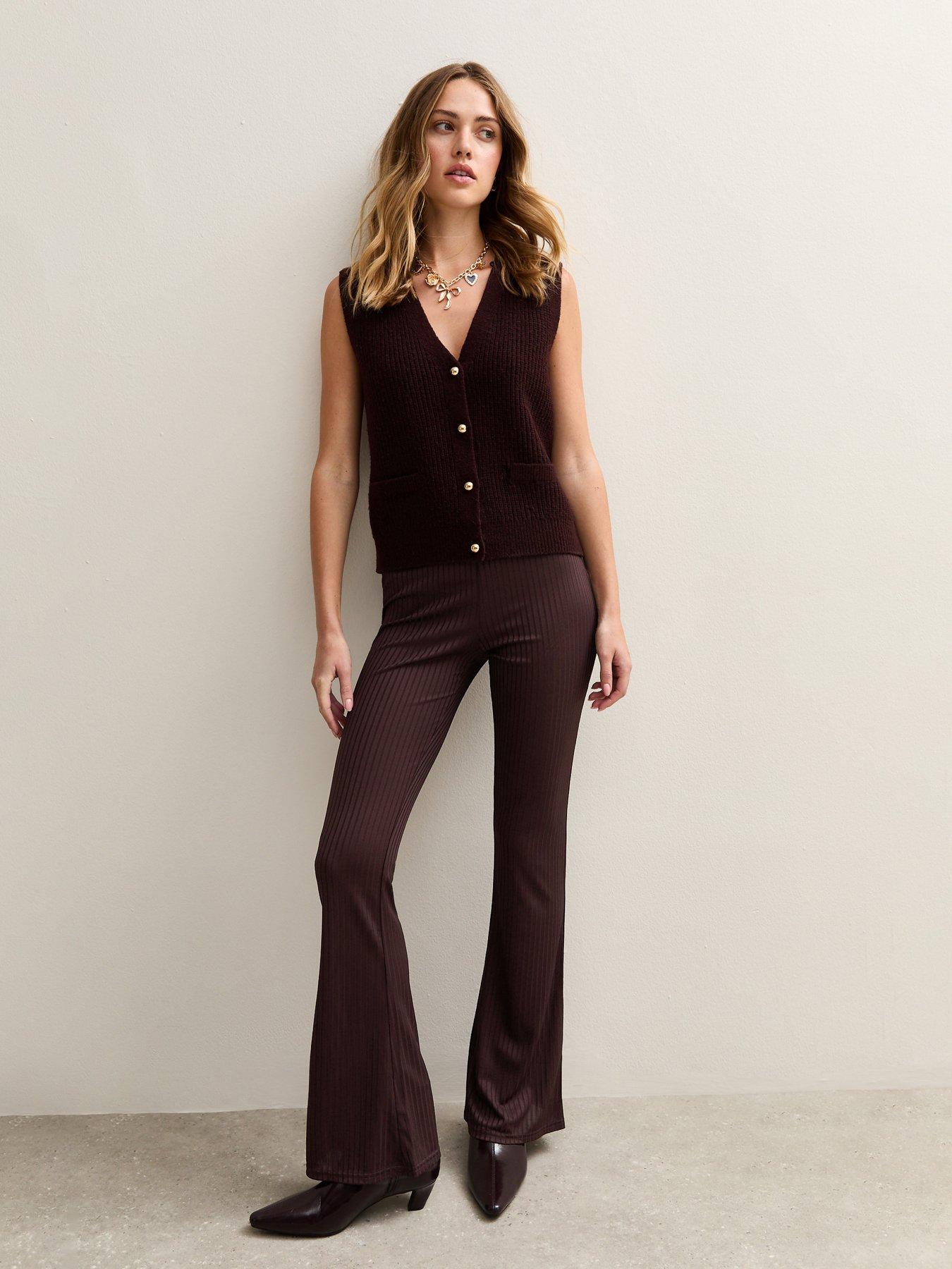 Image 1 of 4 of New Look Ribbed Jersey Flared Trousers - Dark Red