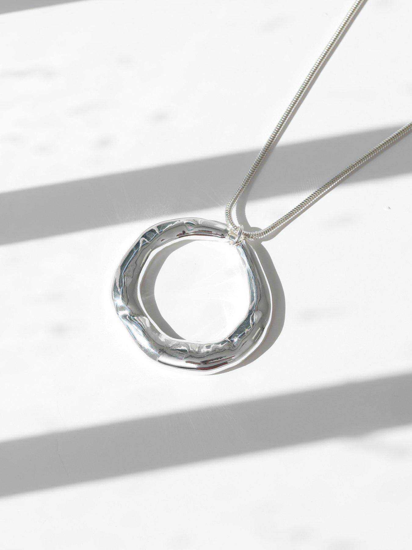 mood-silver-polished-abstract-long-open-pendantstillFront