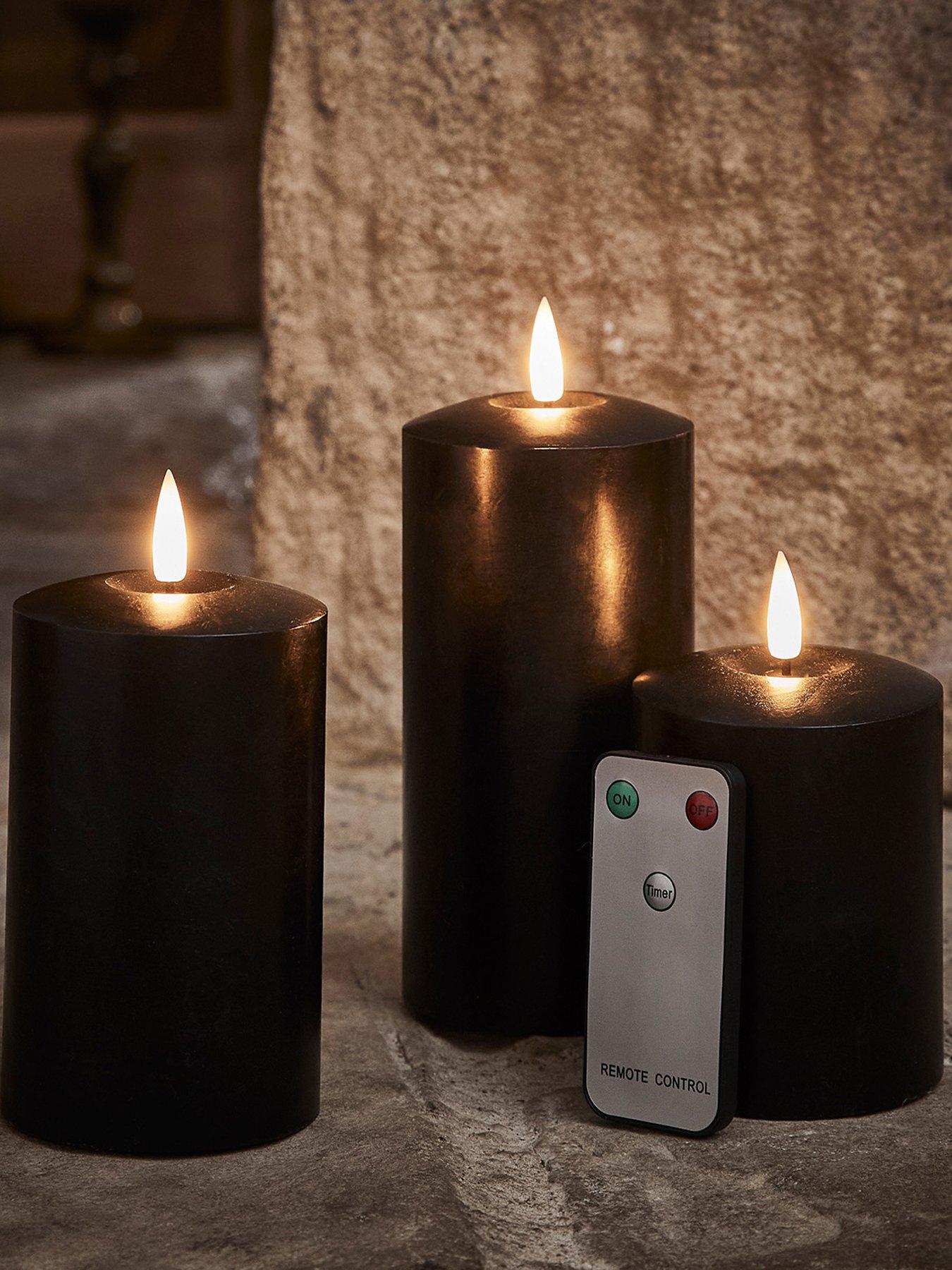 lights4fun-truglow-black-led-pillar-candle-triofront