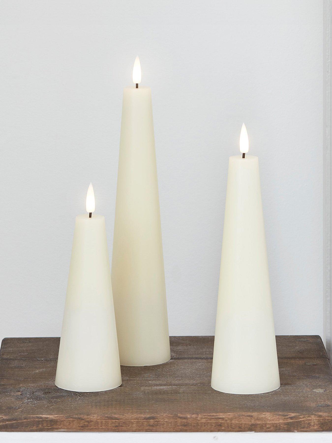 lights4fun-truglow-ivory-cone-led-pillar-candle-triofront