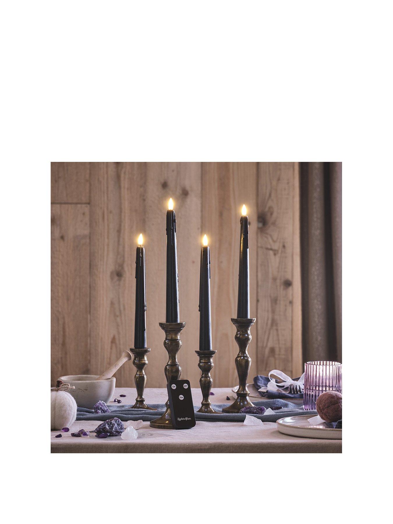 lights4fun-4-truglow-black-dripping-wax-led-taper-candles-with-remote-controlstillFront