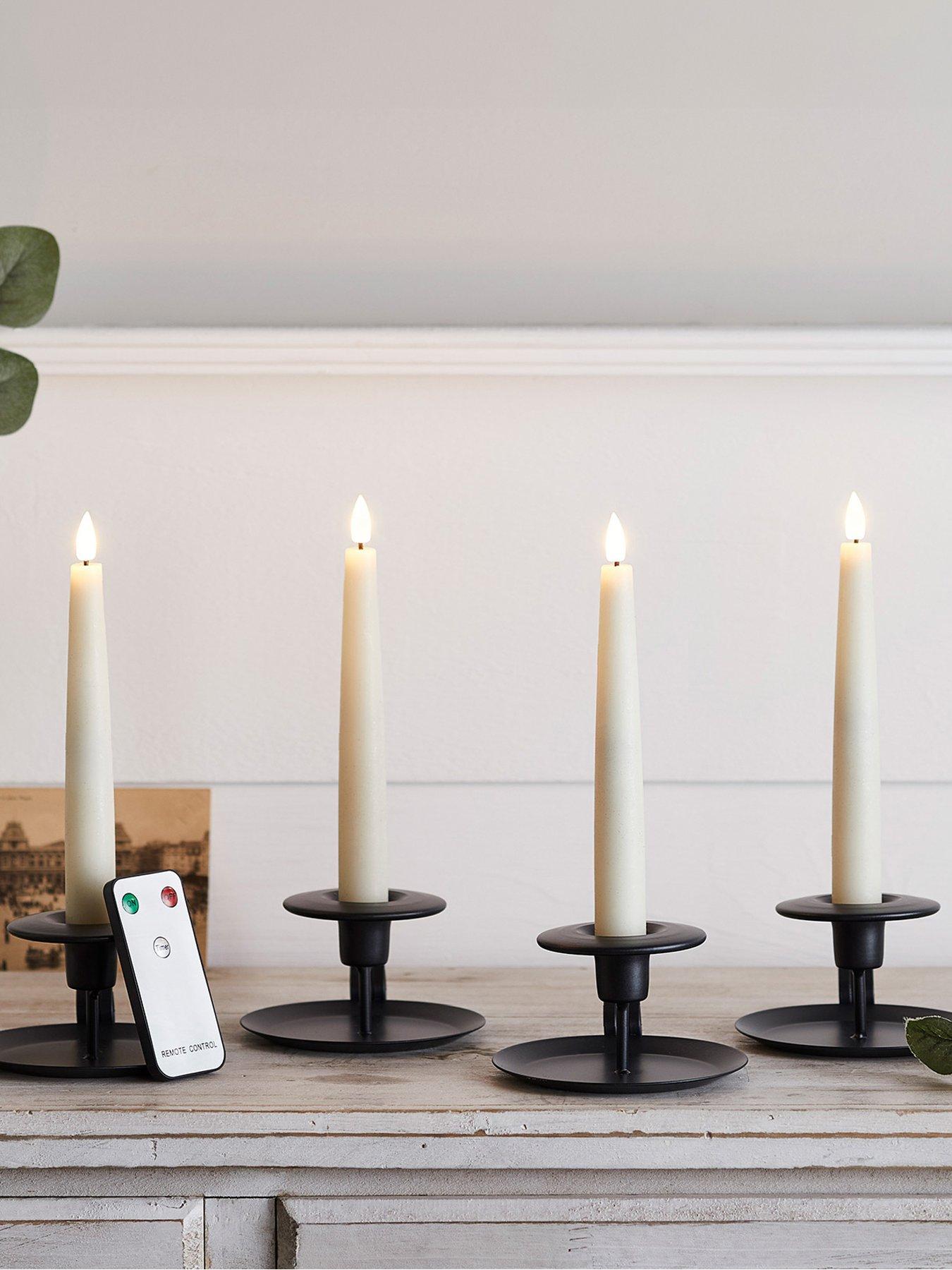 lights4fun-4-ivory-truglow-remote-control-short-led-taper-candles