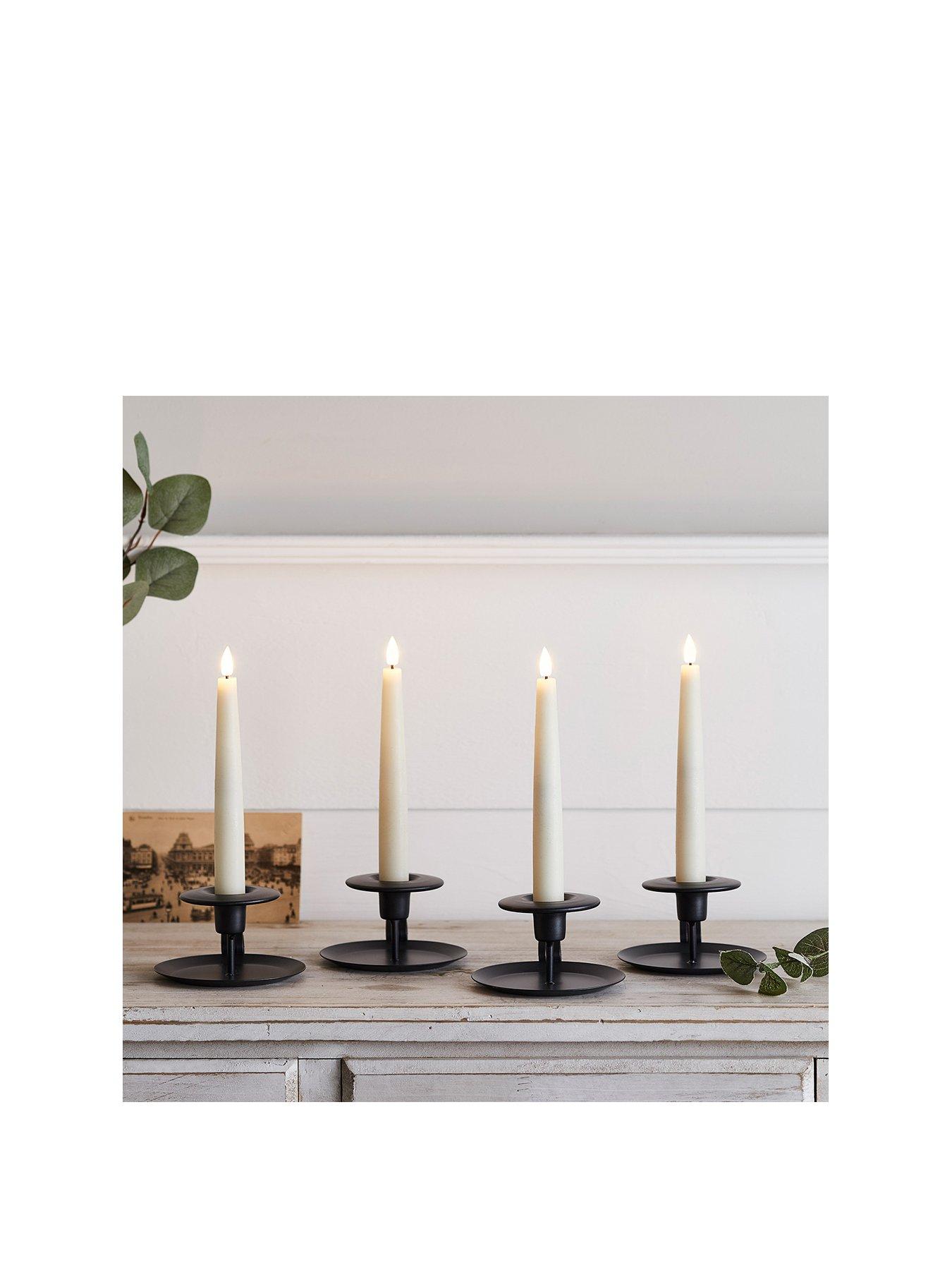 lights4fun-4-ivory-truglow-remote-control-short-led-taper-candlesstillFront