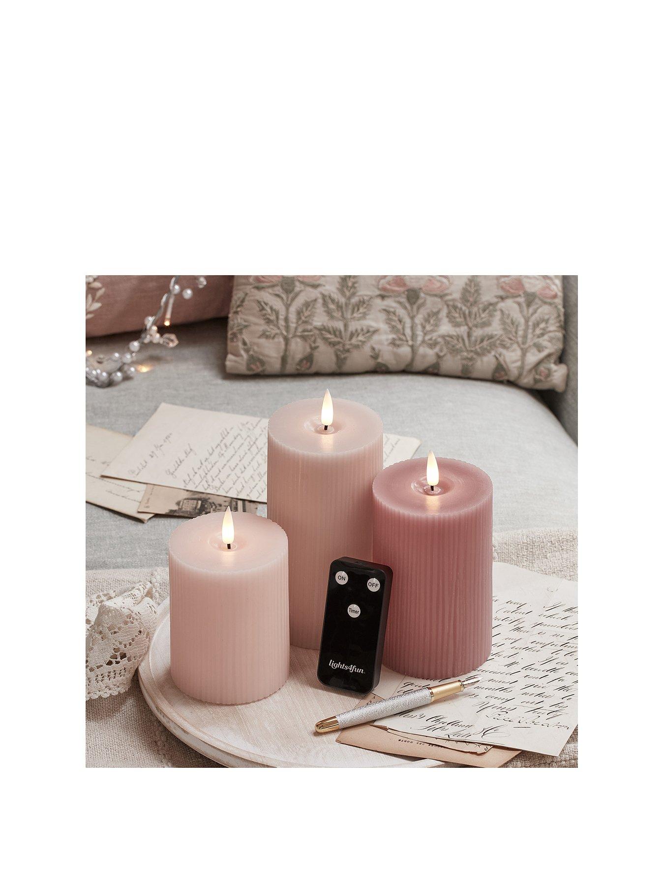 lights4fun-truglow-blush-pink-ribbed-led-pillar-candle-triostillFront